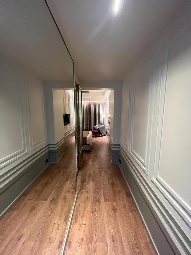 Bed in Hotel Poonja International