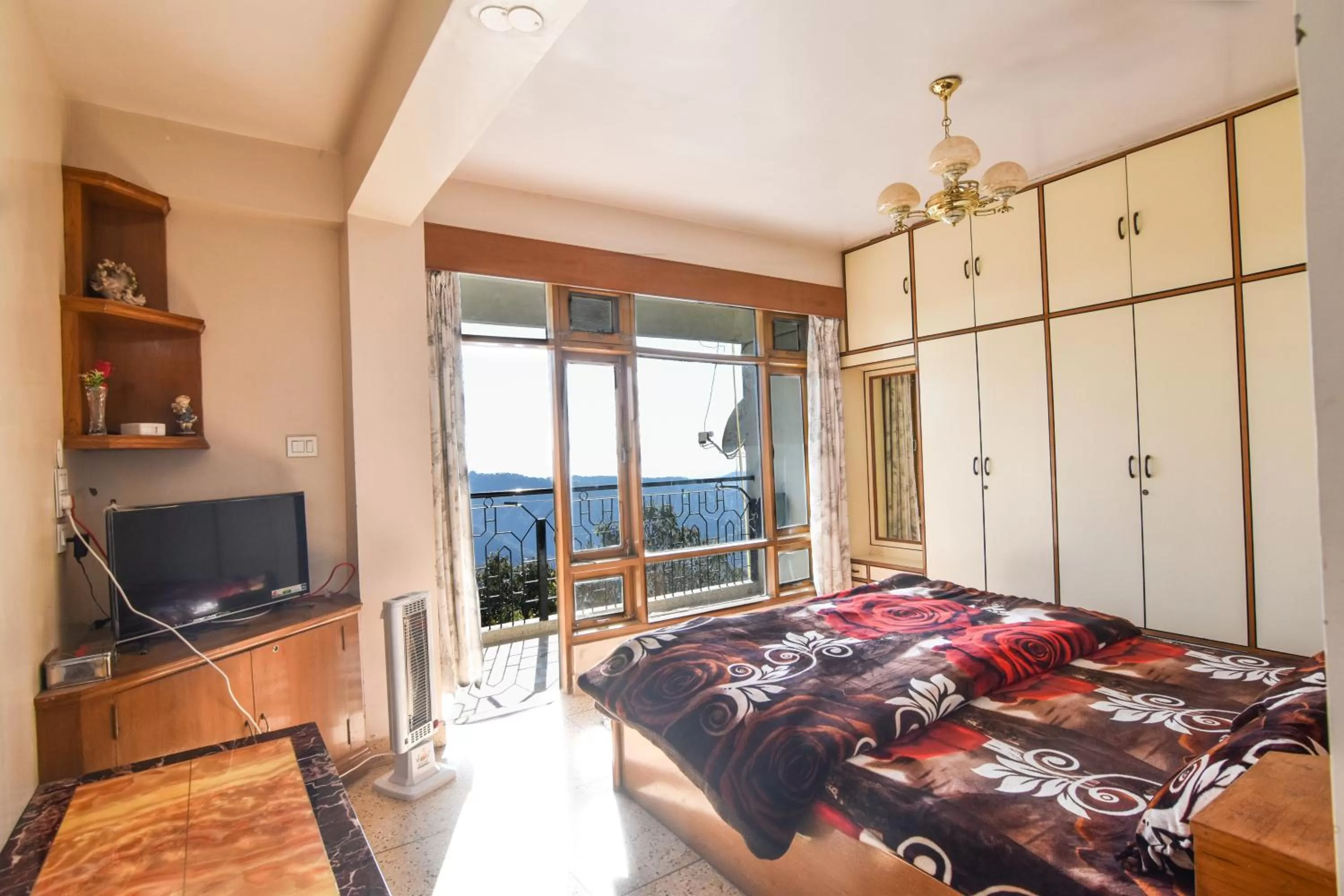 Bedroom in Dhanlaxmi Apartments