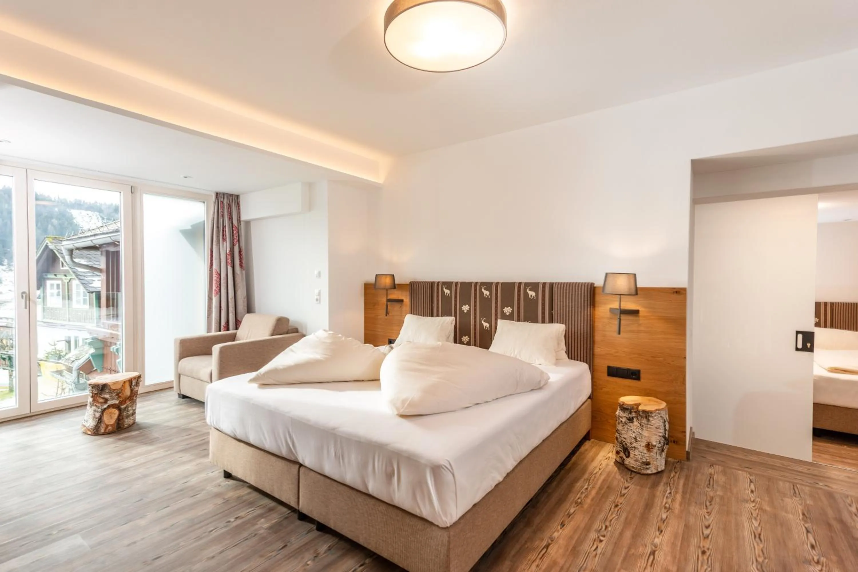 Photo of the whole room, Bed in Aktivhotel Pehab - Dachstein Rooftop-Spa