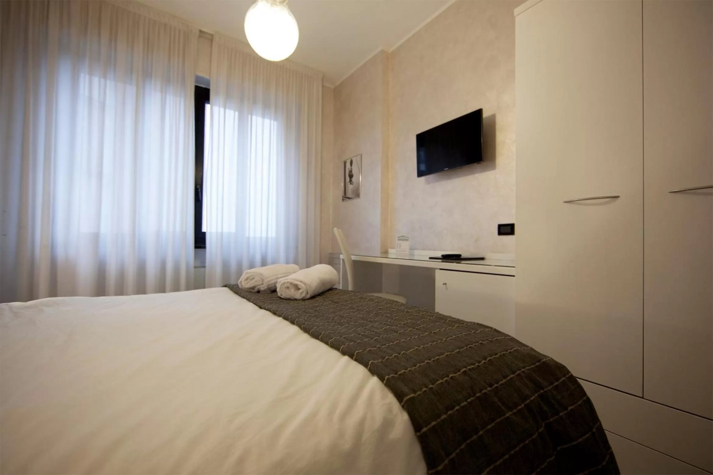 Decorative detail, Bed in Piccolo Hotel Allamano