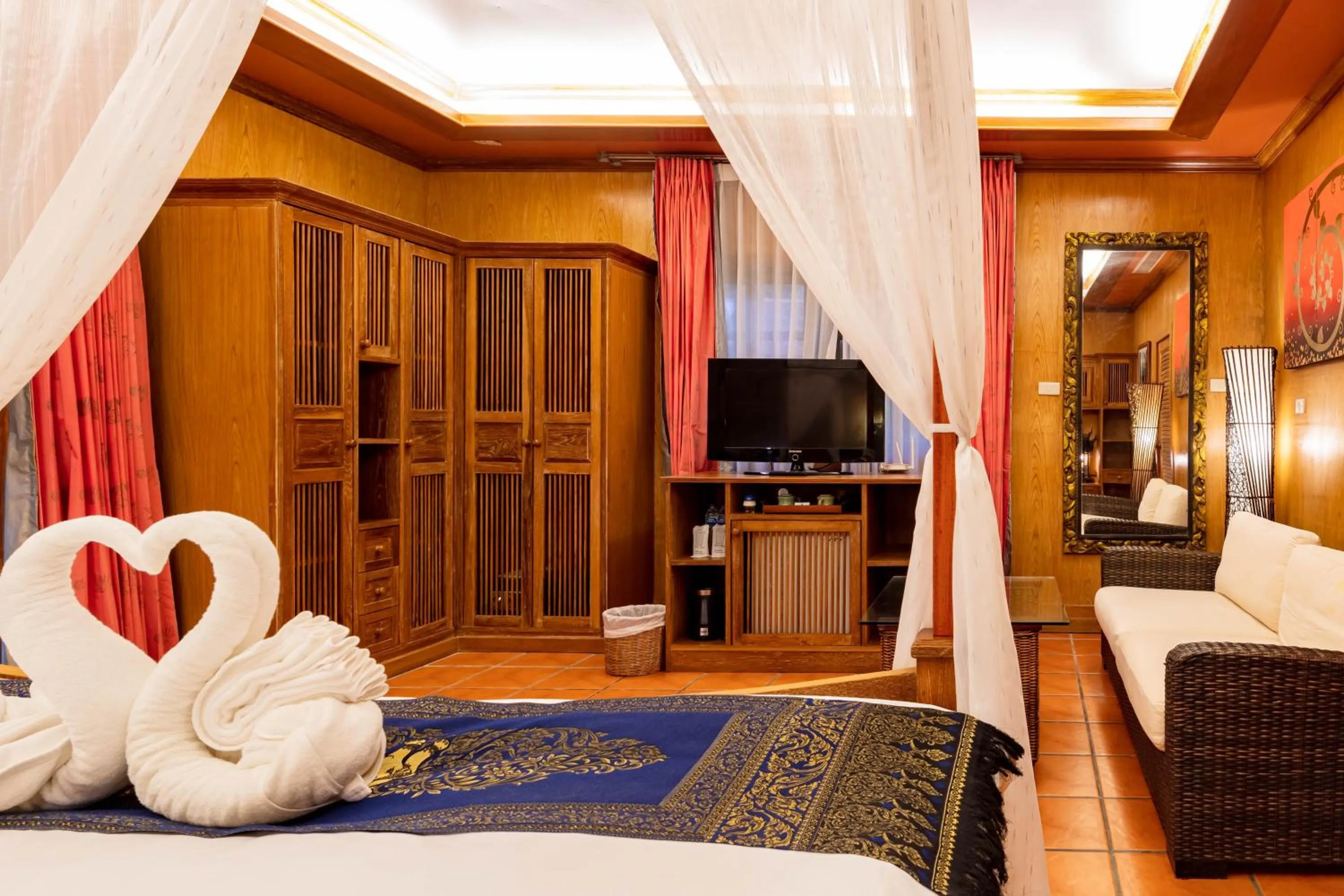 Photo of the whole room, Bed in Royal Phawadee Village Patong - 2 Minutes walk to the beach