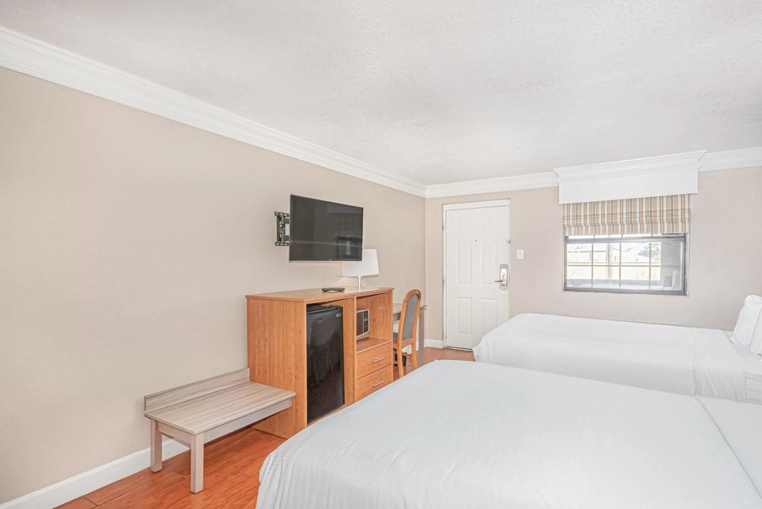 Bed in Casa Bella Inn & Suites Extended Stay