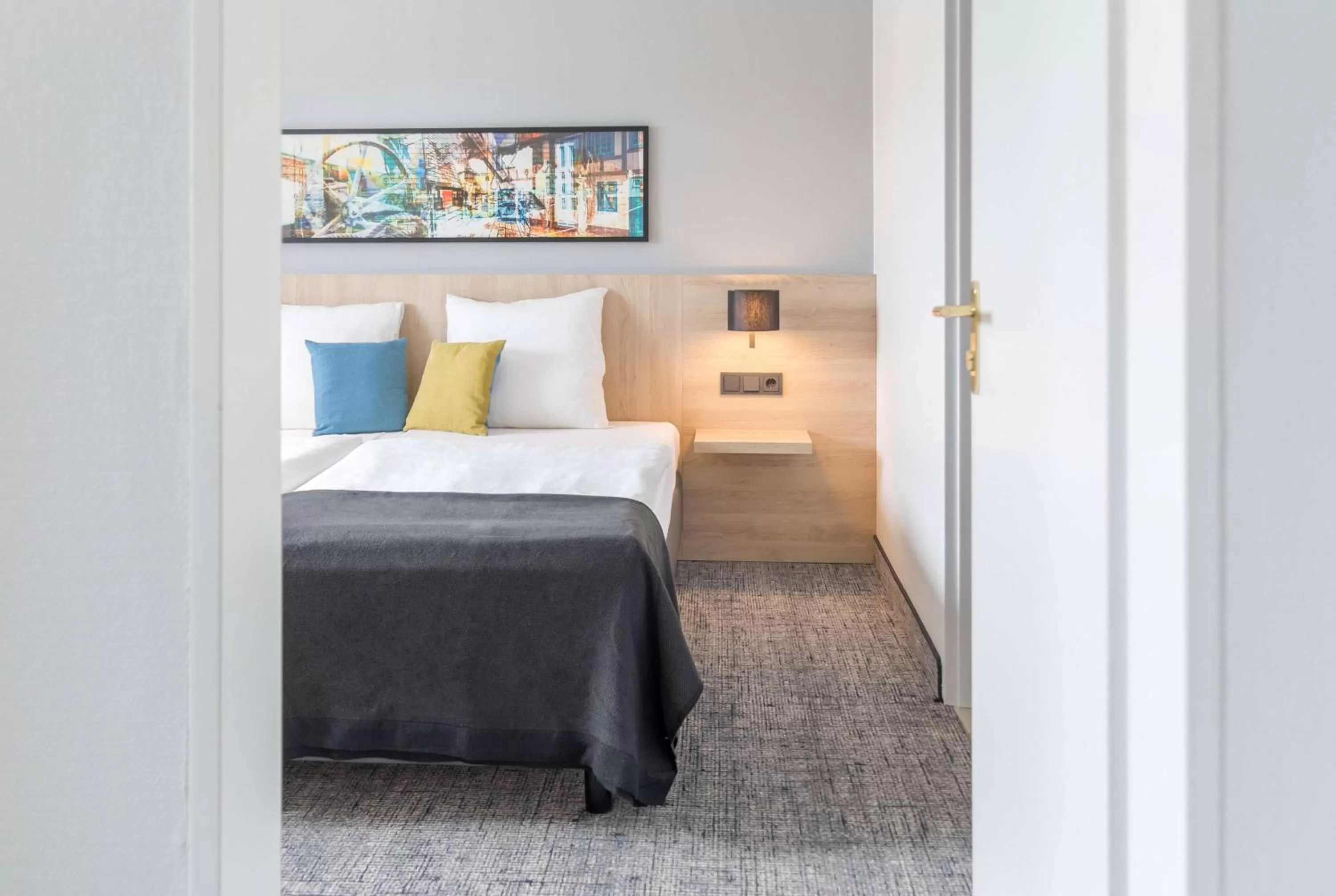 Bed in Ramada by Wyndham Flensburg City