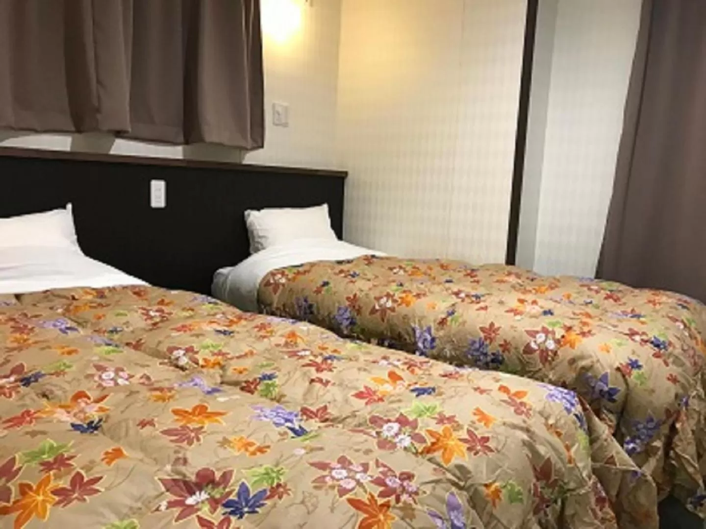 Bed in Hotel Famitic Nikko Station