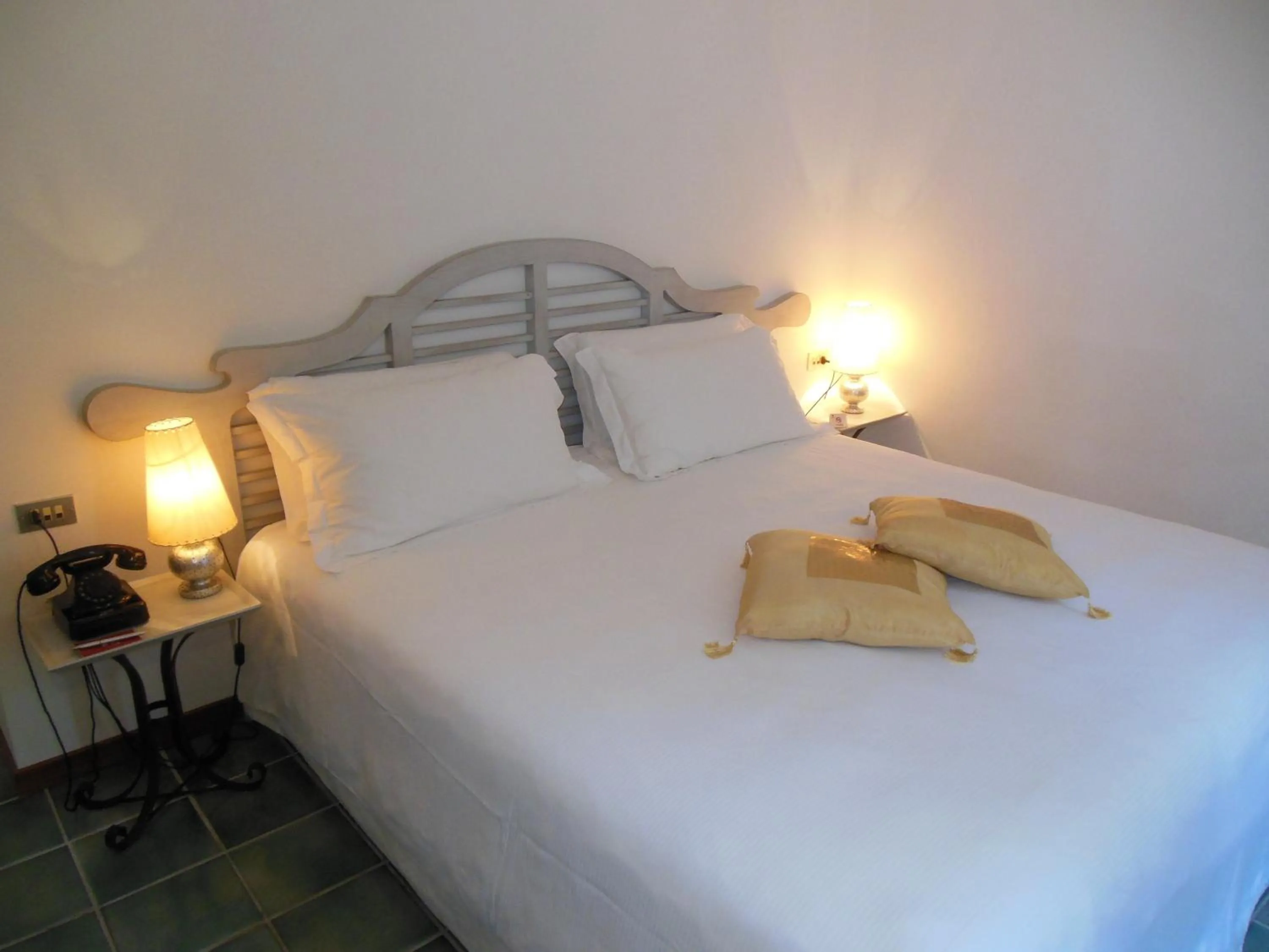 Bed in La Locanda Delle Donne Monache