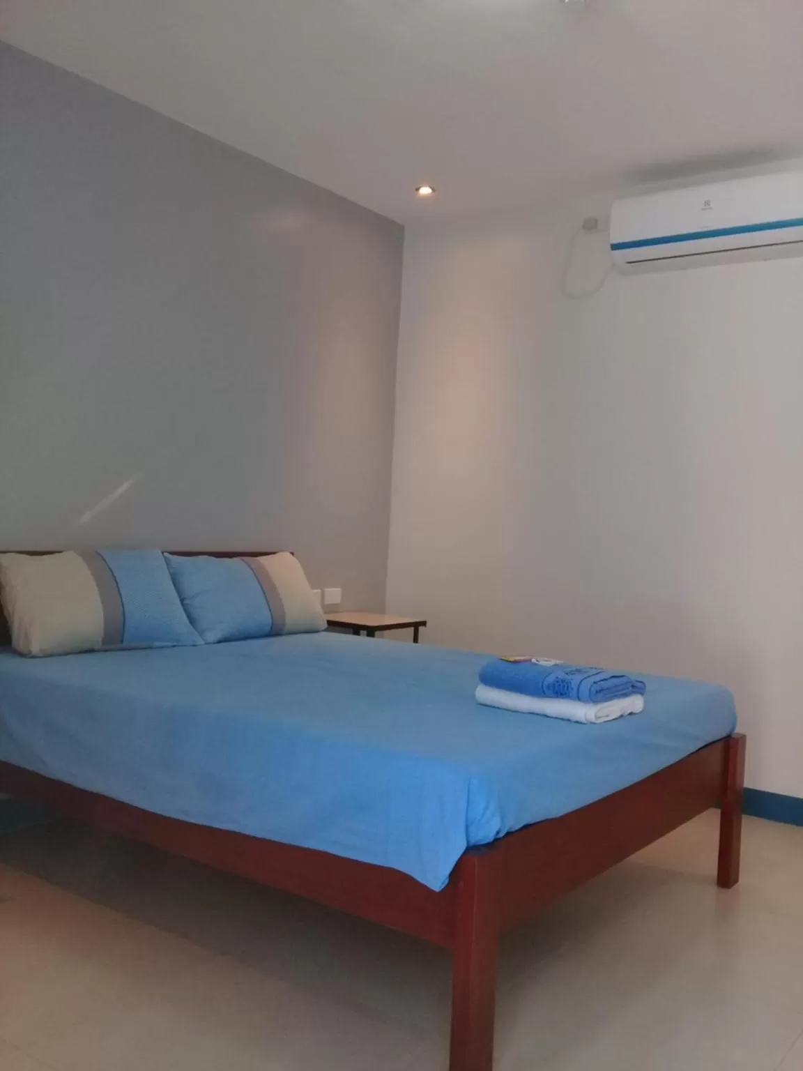 Bed in D & B BLUESTAR BEACH RESORT