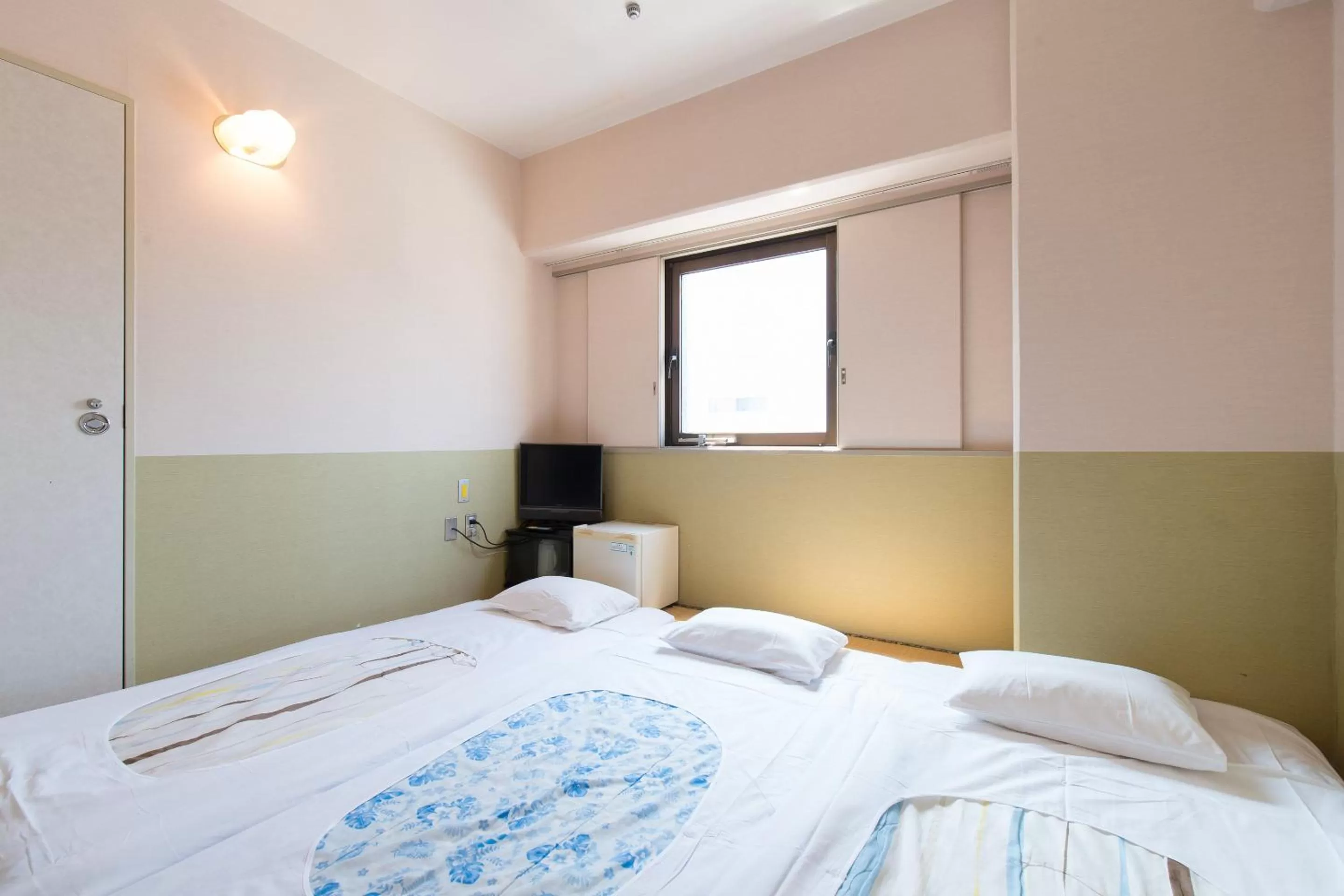 Photo of the whole room, Bed in Tabist Hotel Tetora Kitakyushu