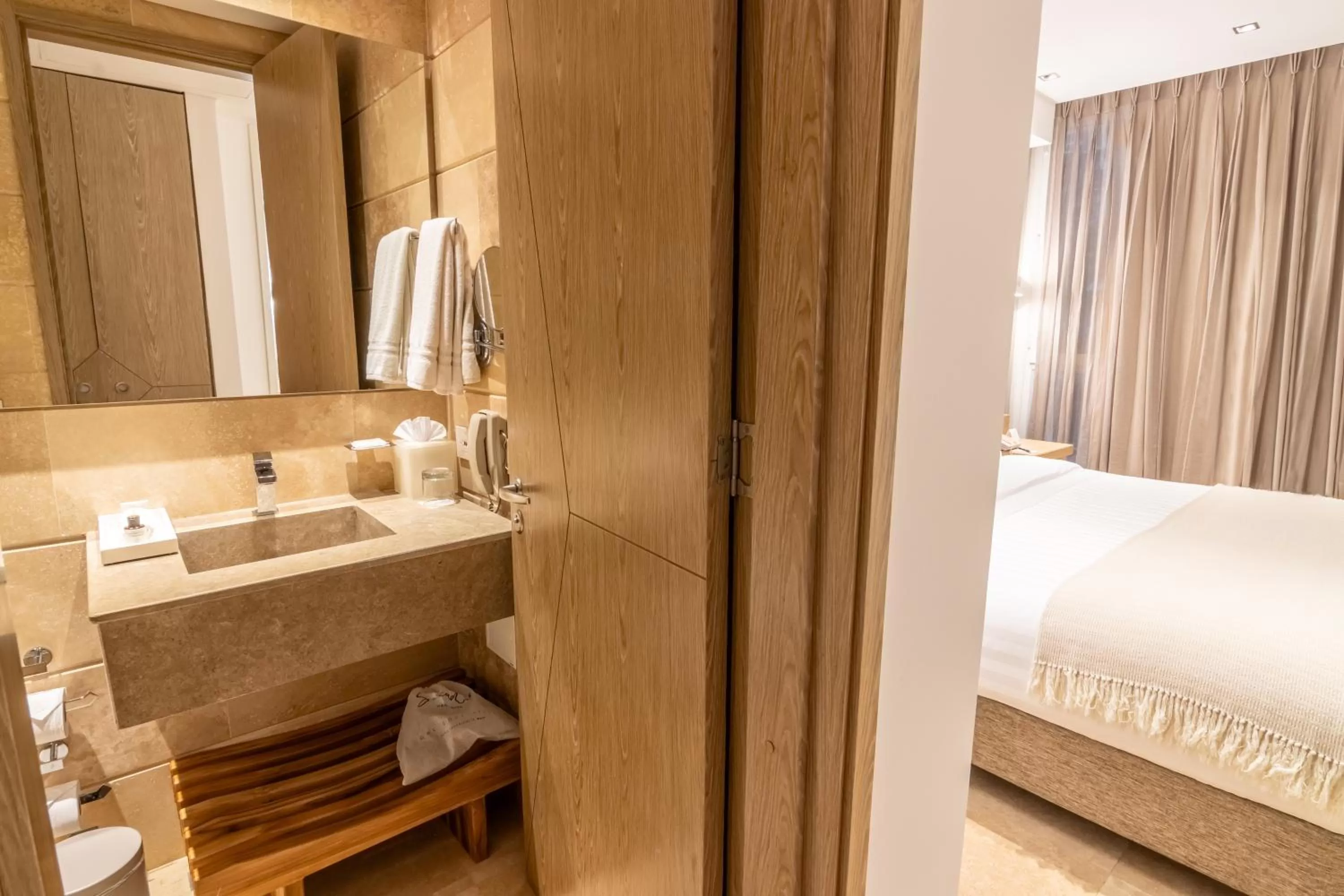 Bed in GHL Arsenal Hotel