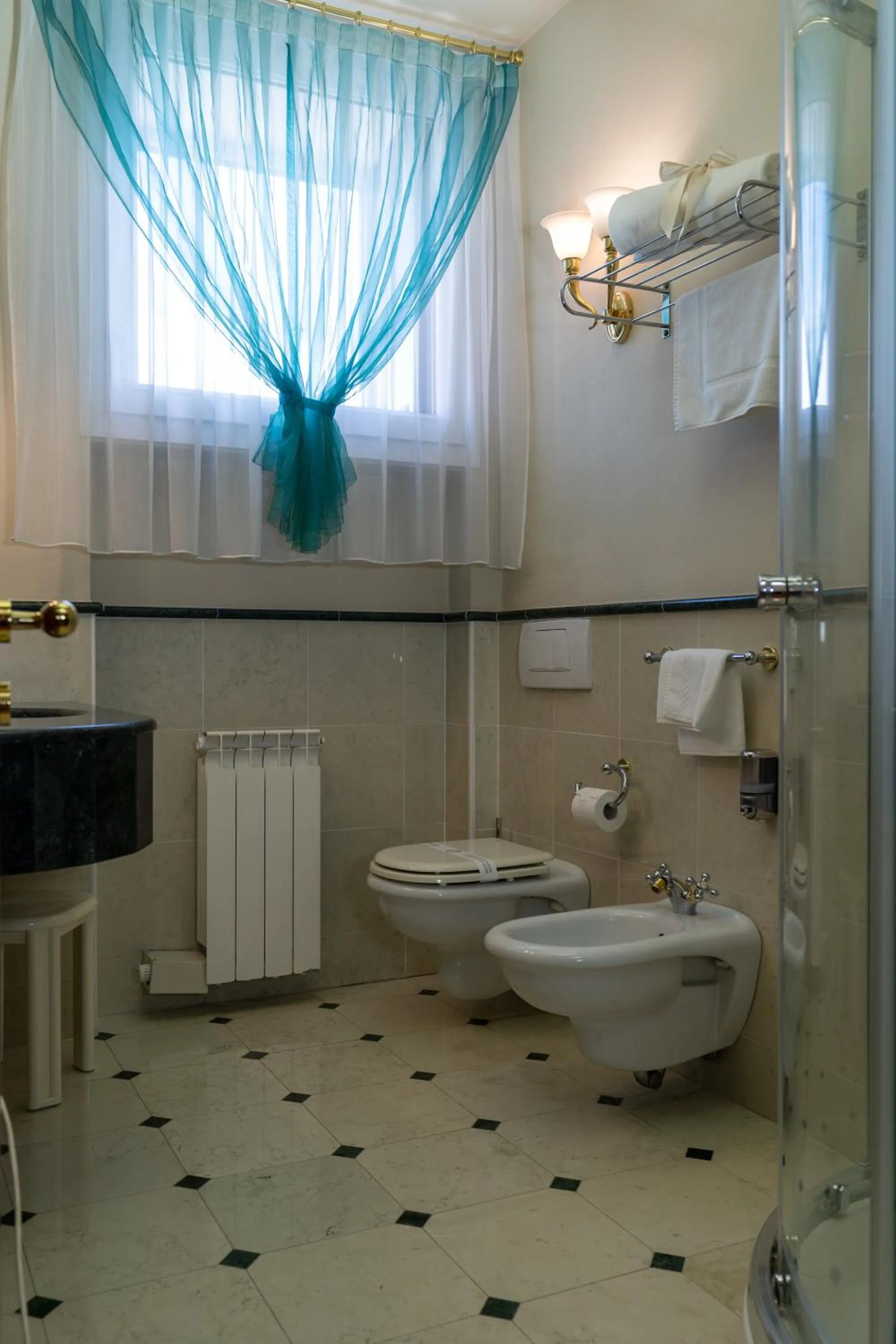 Toilet in Le Muse Hotel