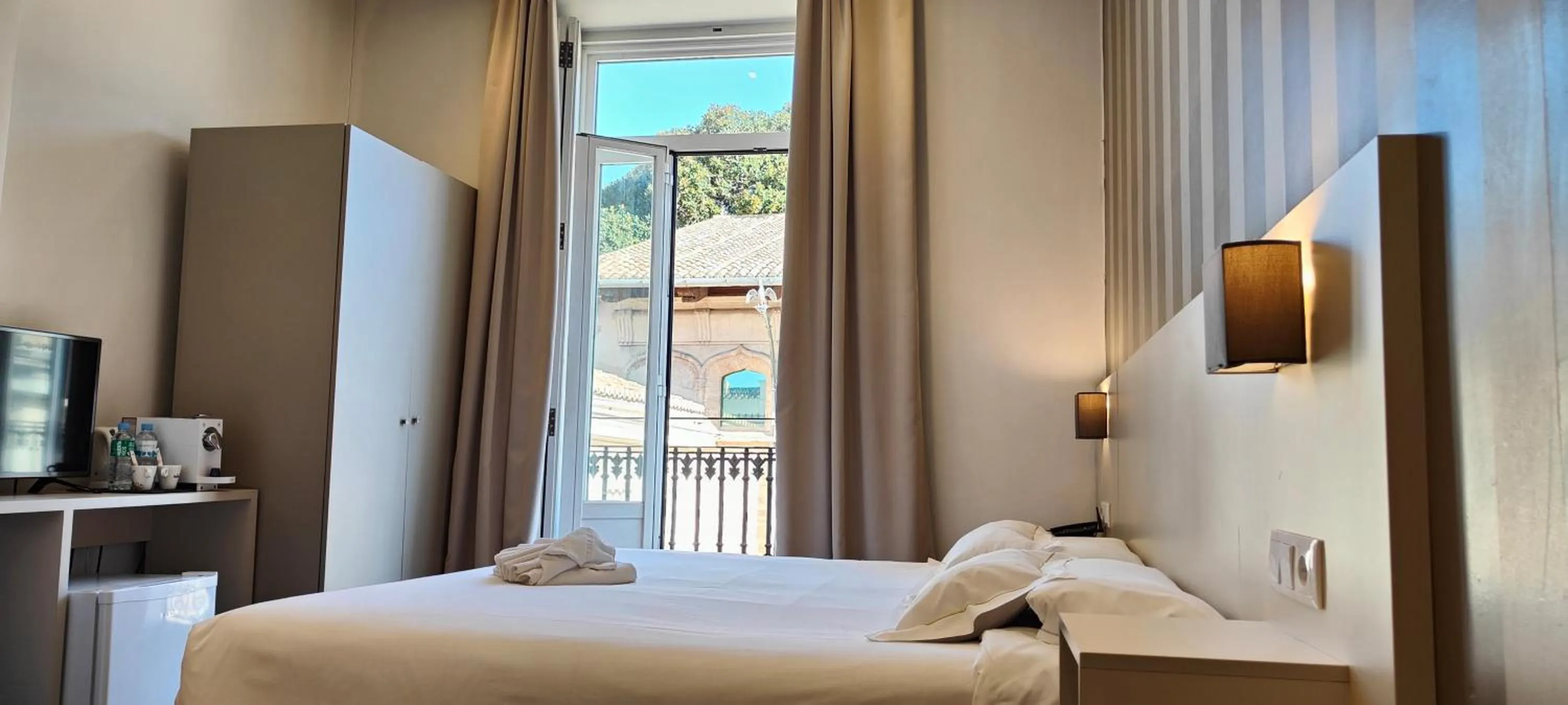 Bed in Hotel San Lorenzo Boutique Plaza