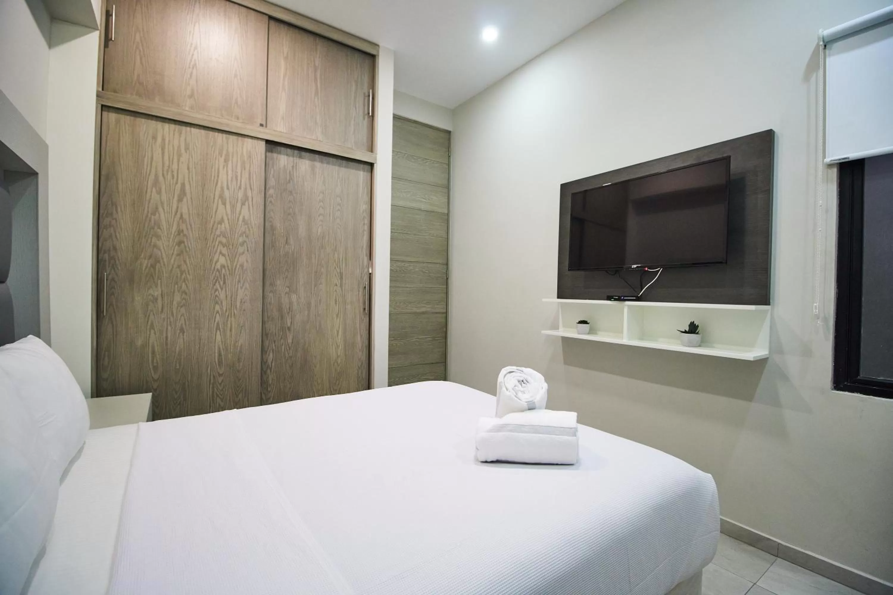 Bed in Torre 42 Playa del Carmen by Lockey