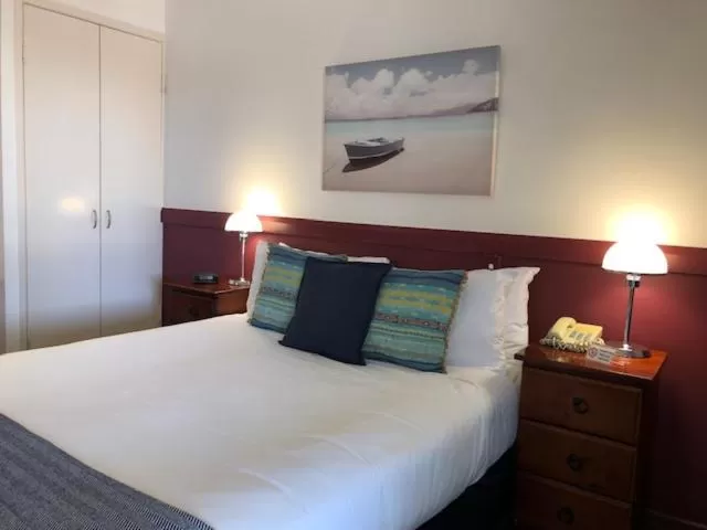 Bed in Central Studio Accommodation