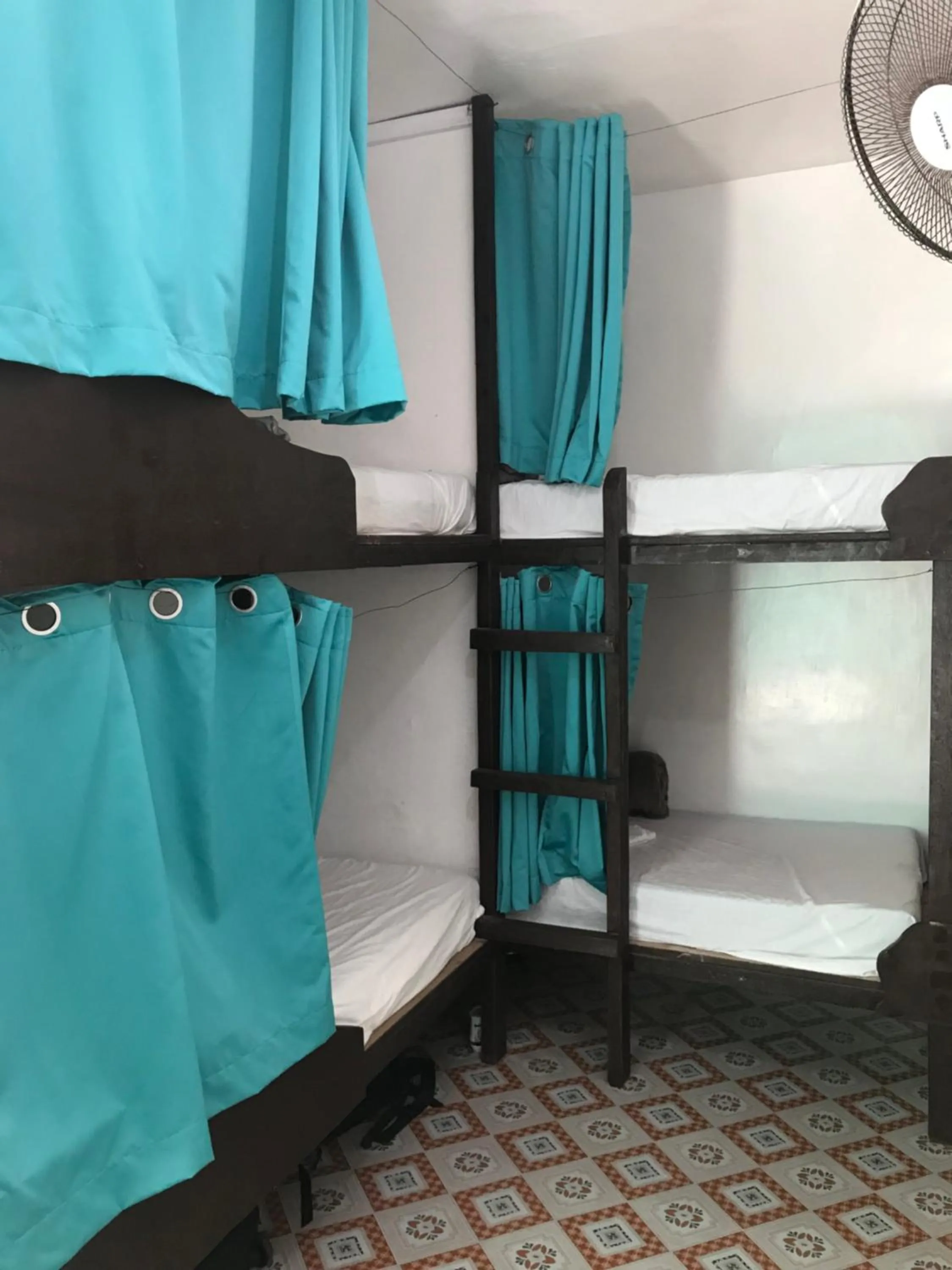Photo of the whole room, Bed in Malapascua Budget Inn MBI DIVE CENTER