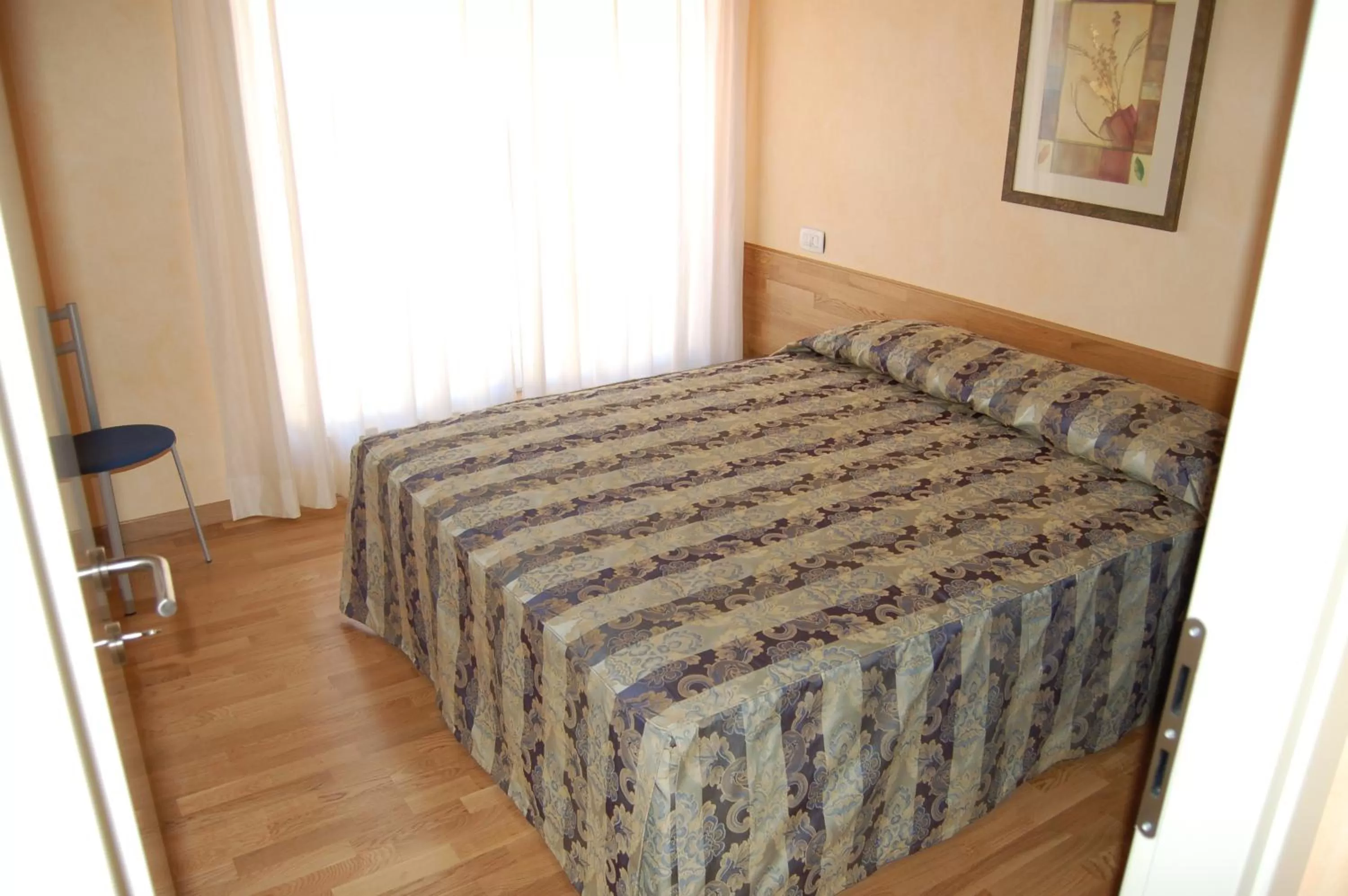 Bed in Hotel Concordia