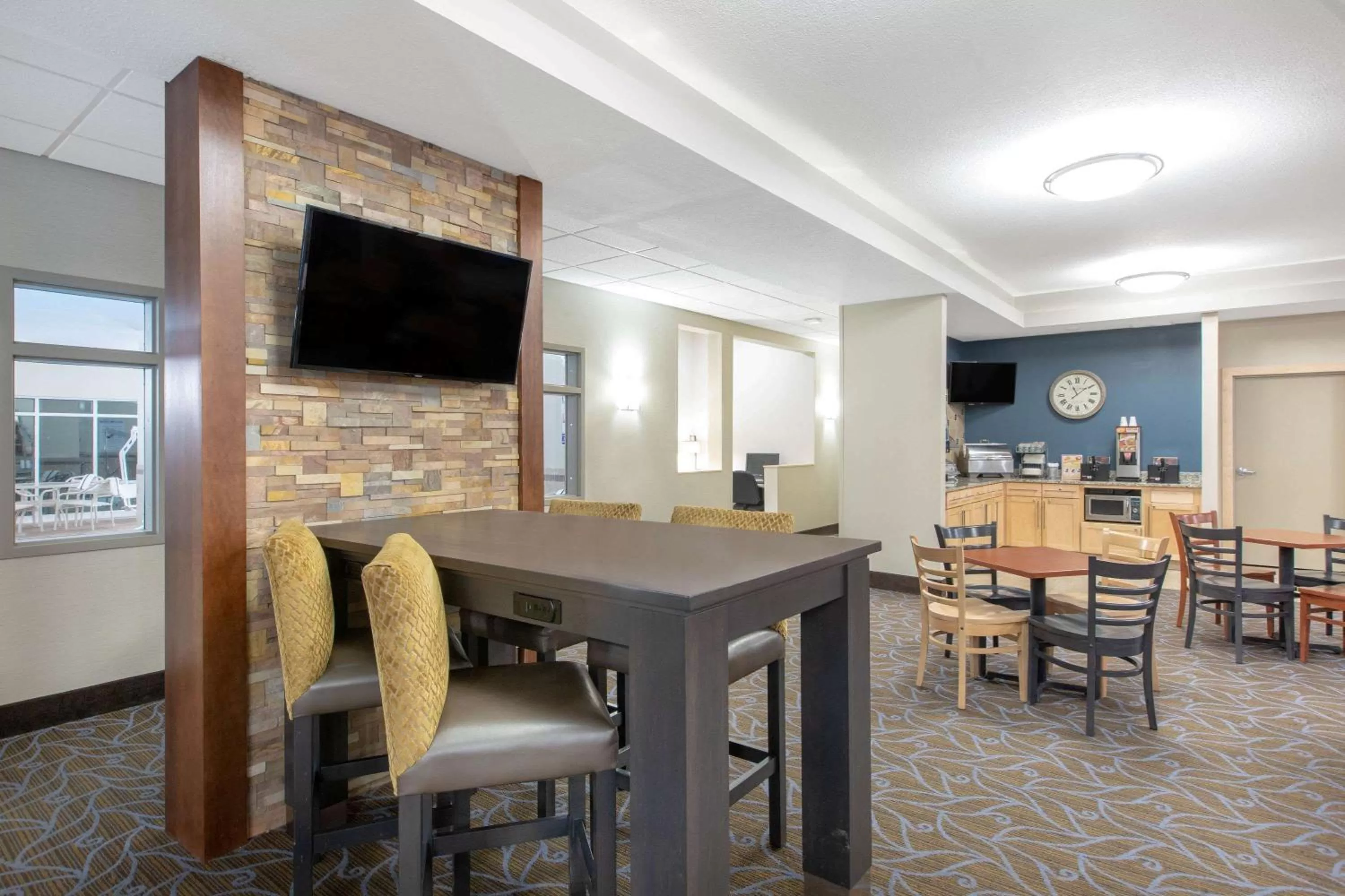 Lobby or reception in AmericInn by Wyndham Humboldt