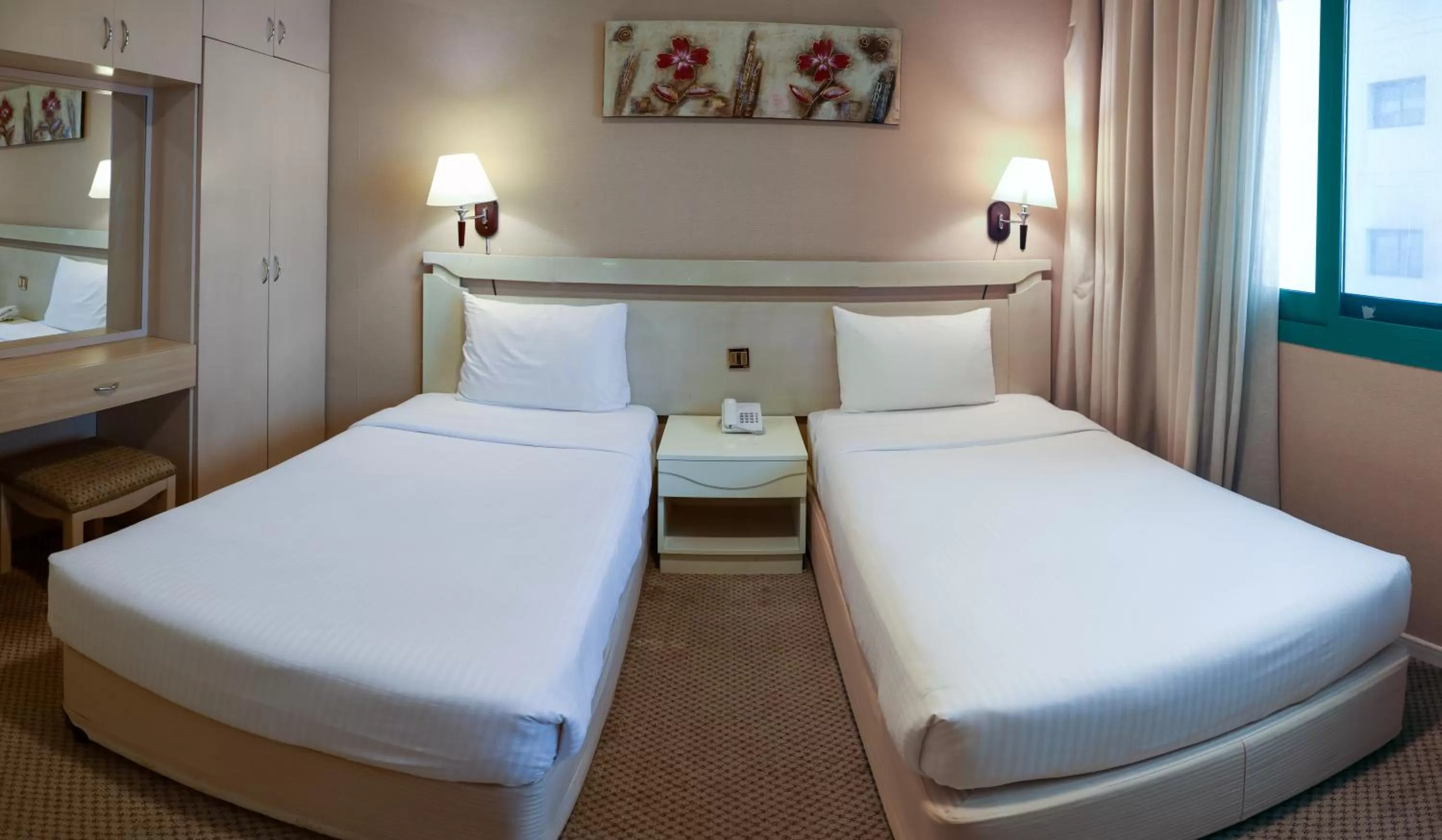 Bed in West Zone Pearl Hotel Apartment