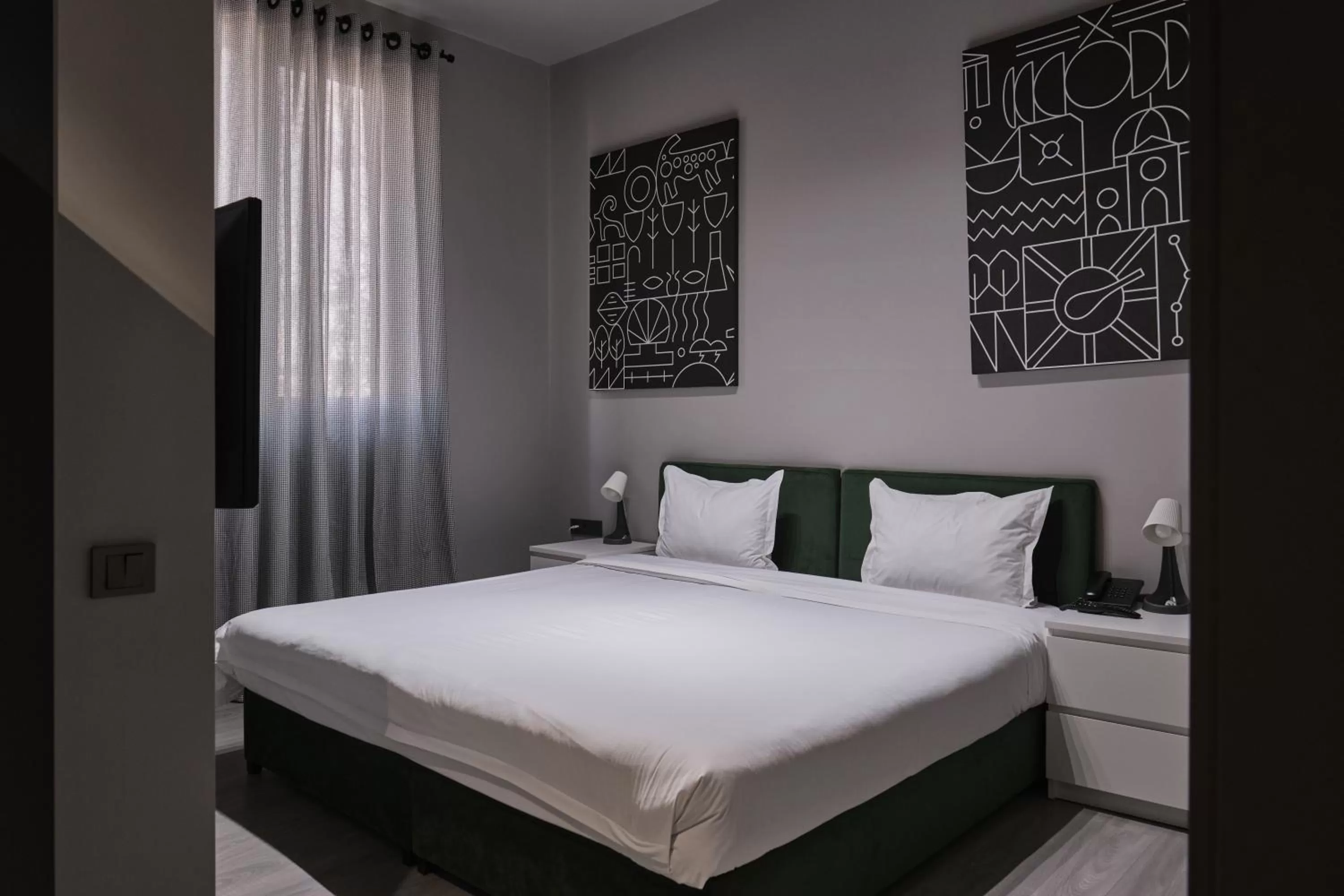 Bed in Sapiens Hotel