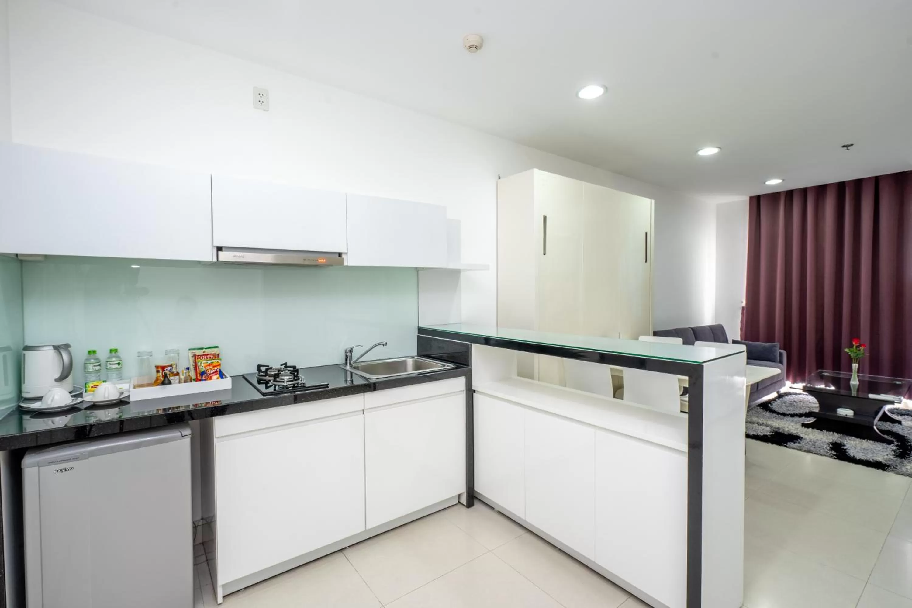 Kitchen or kitchenette in Becamex Hotel Thu Dau Mot