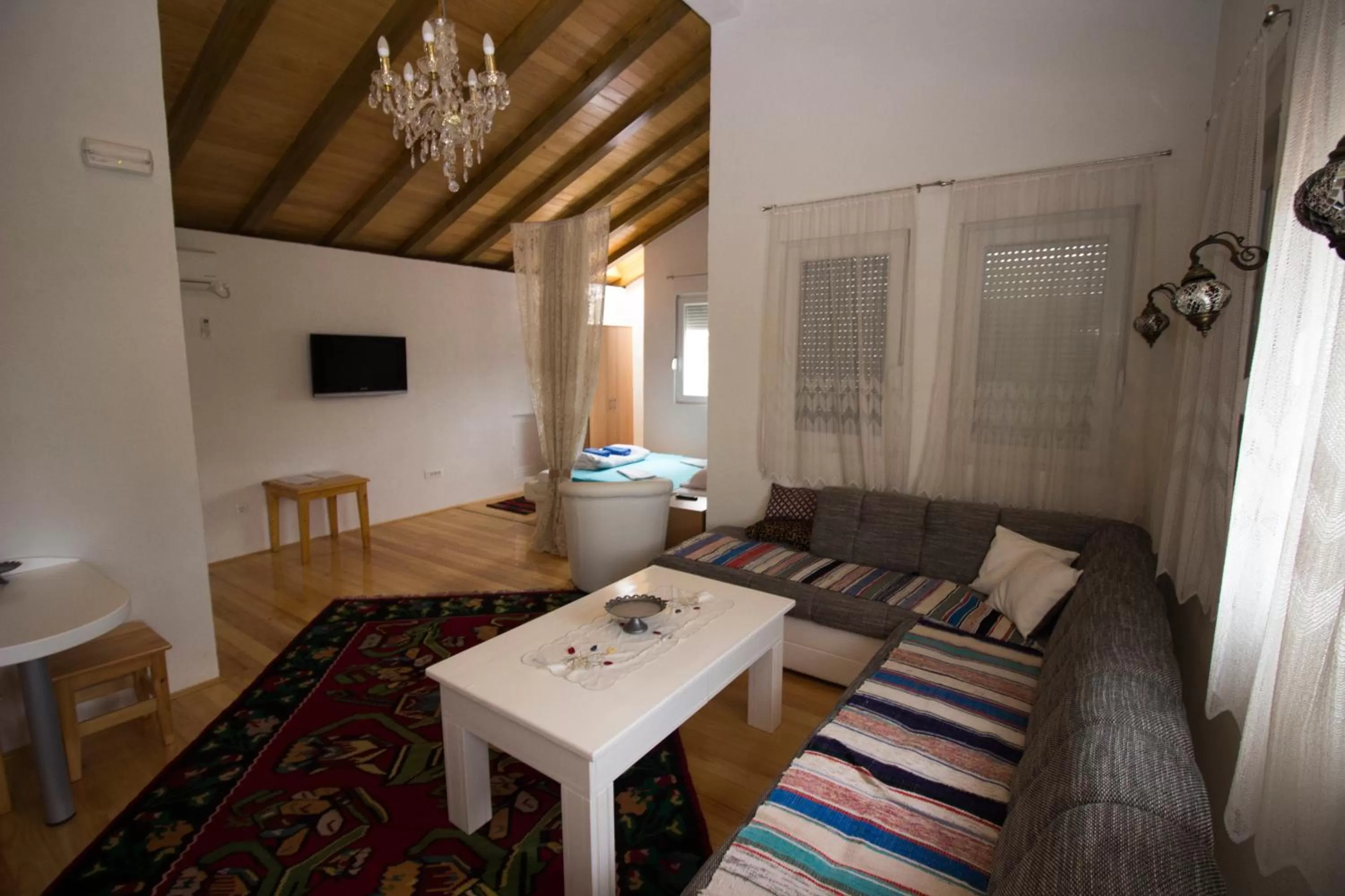 TV and multimedia, Seating Area in Hotel & Rooms Lombrelle