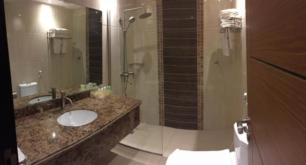 Bathroom in Arjaan Altakhassusi Hotel Suites