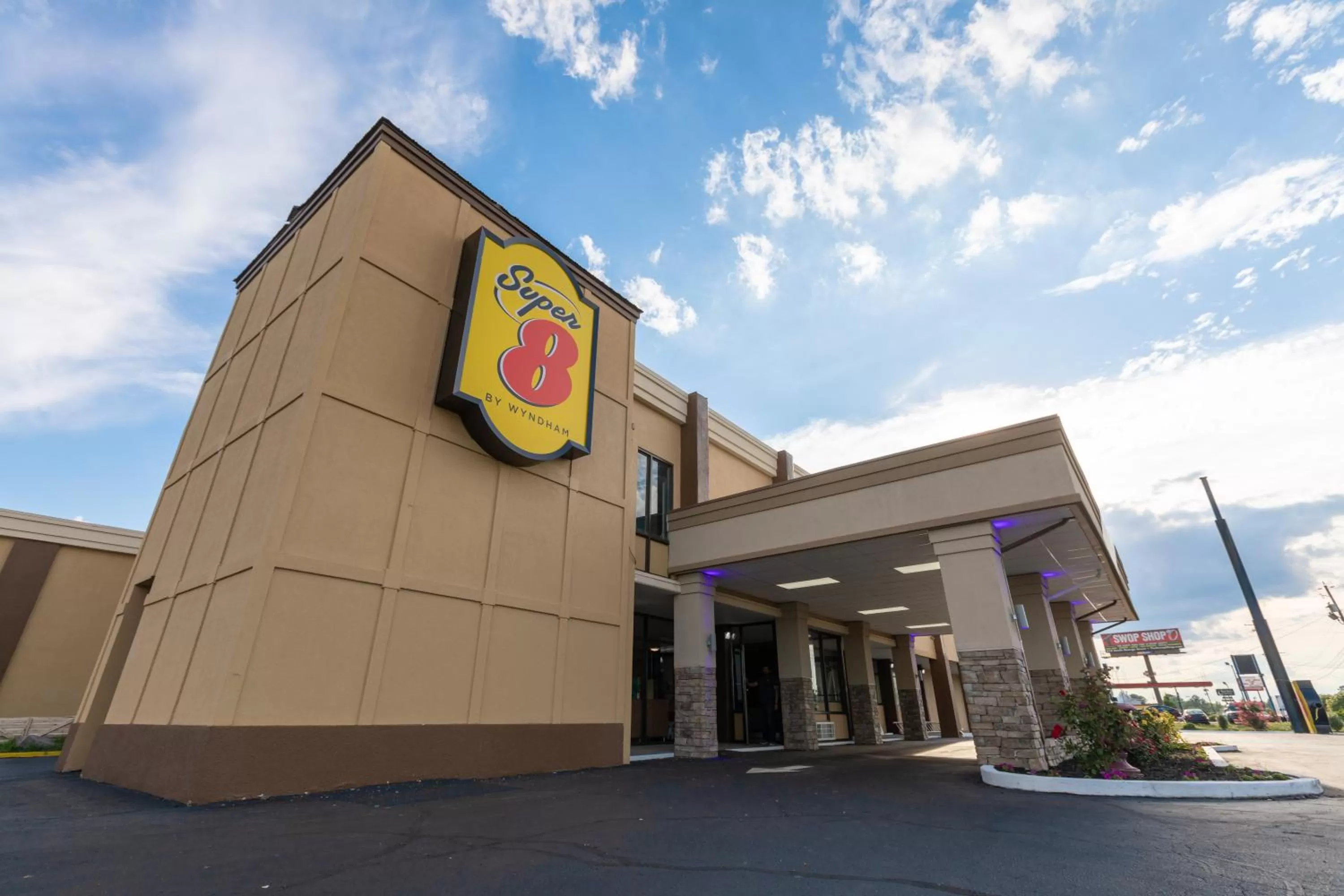 Property logo or sign in Super 8 by Wyndham Goldsboro