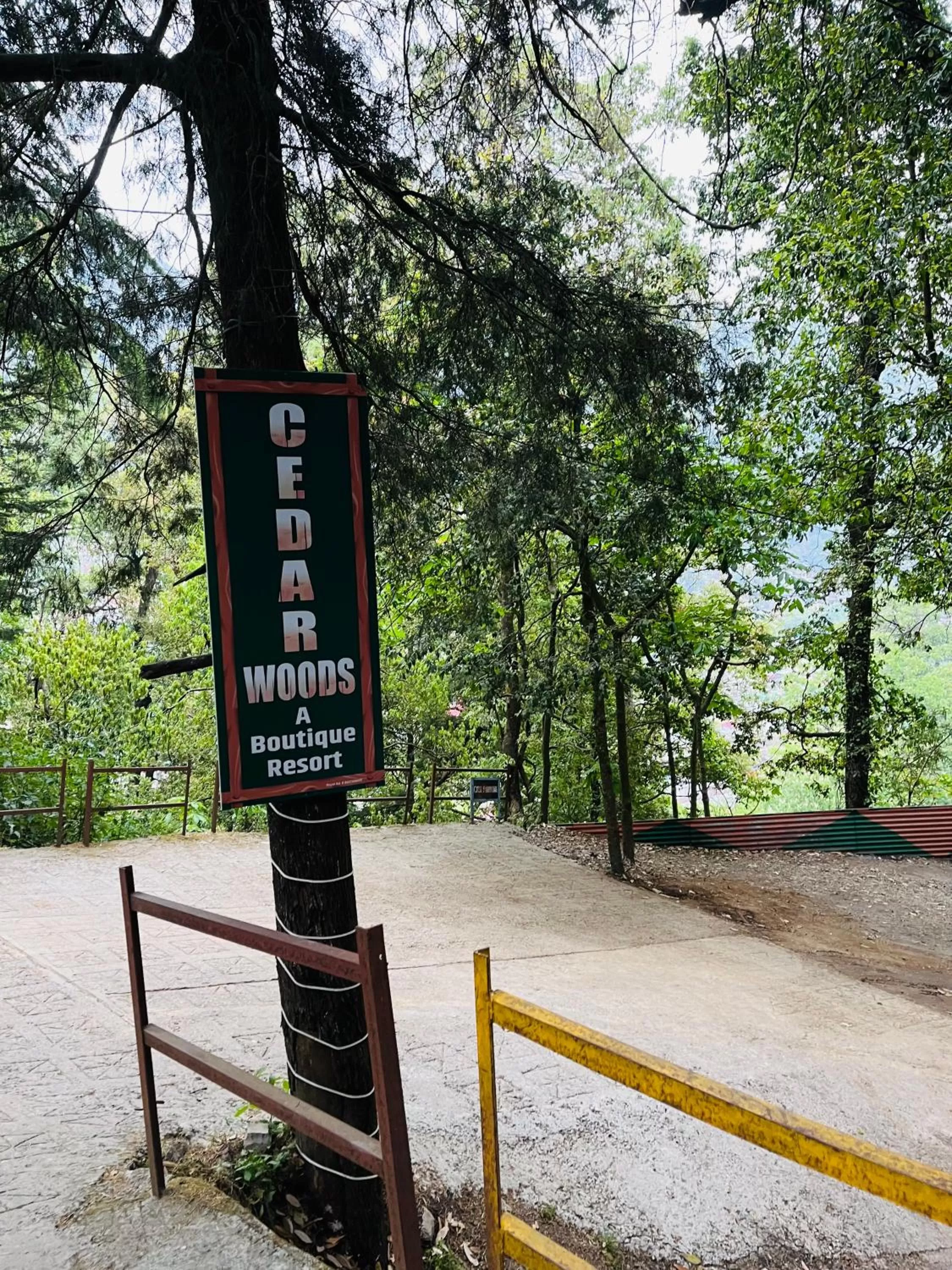 Property logo or sign in Cedar Woods Resort