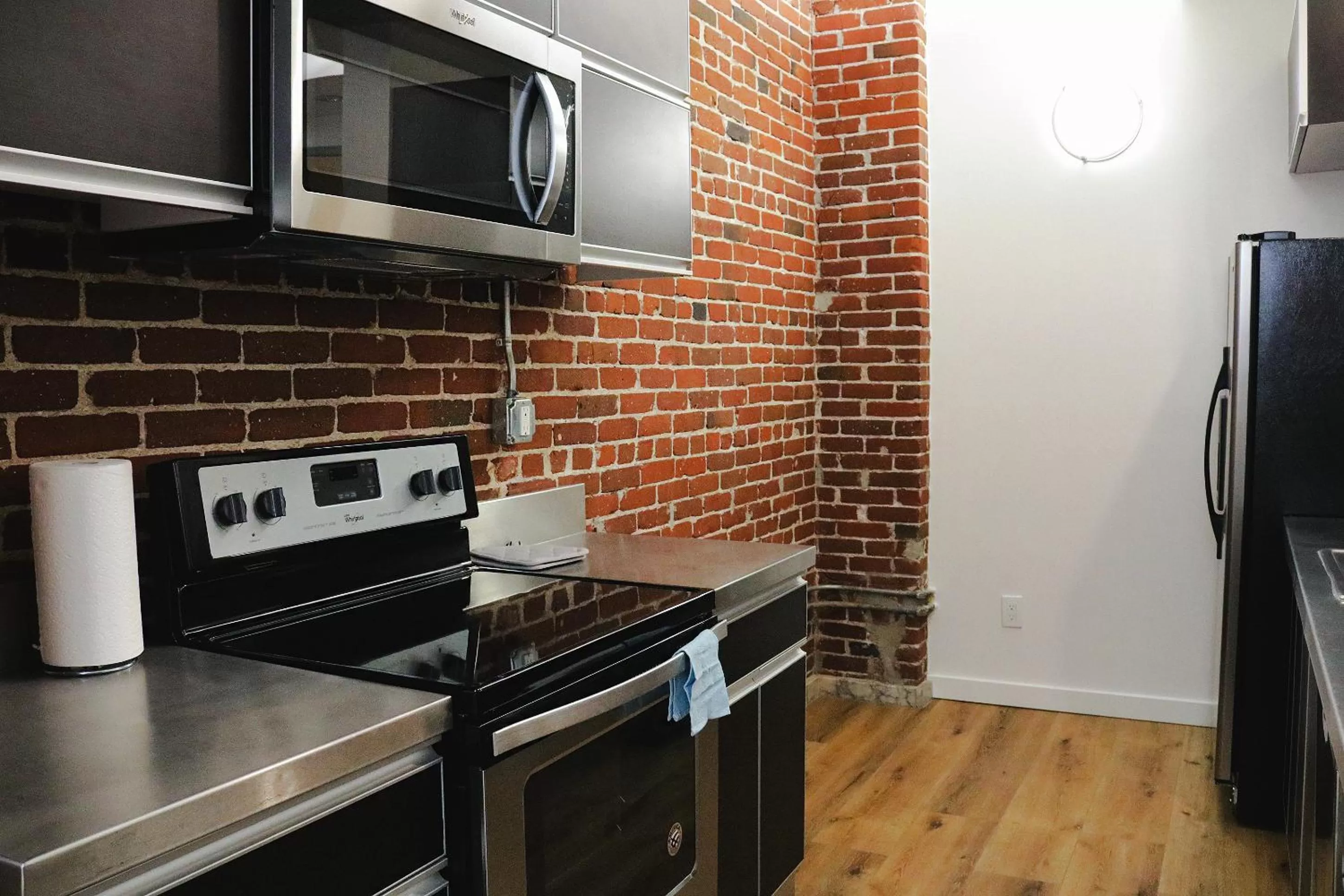 Kitchen/Kitchenette in The Haas Suites