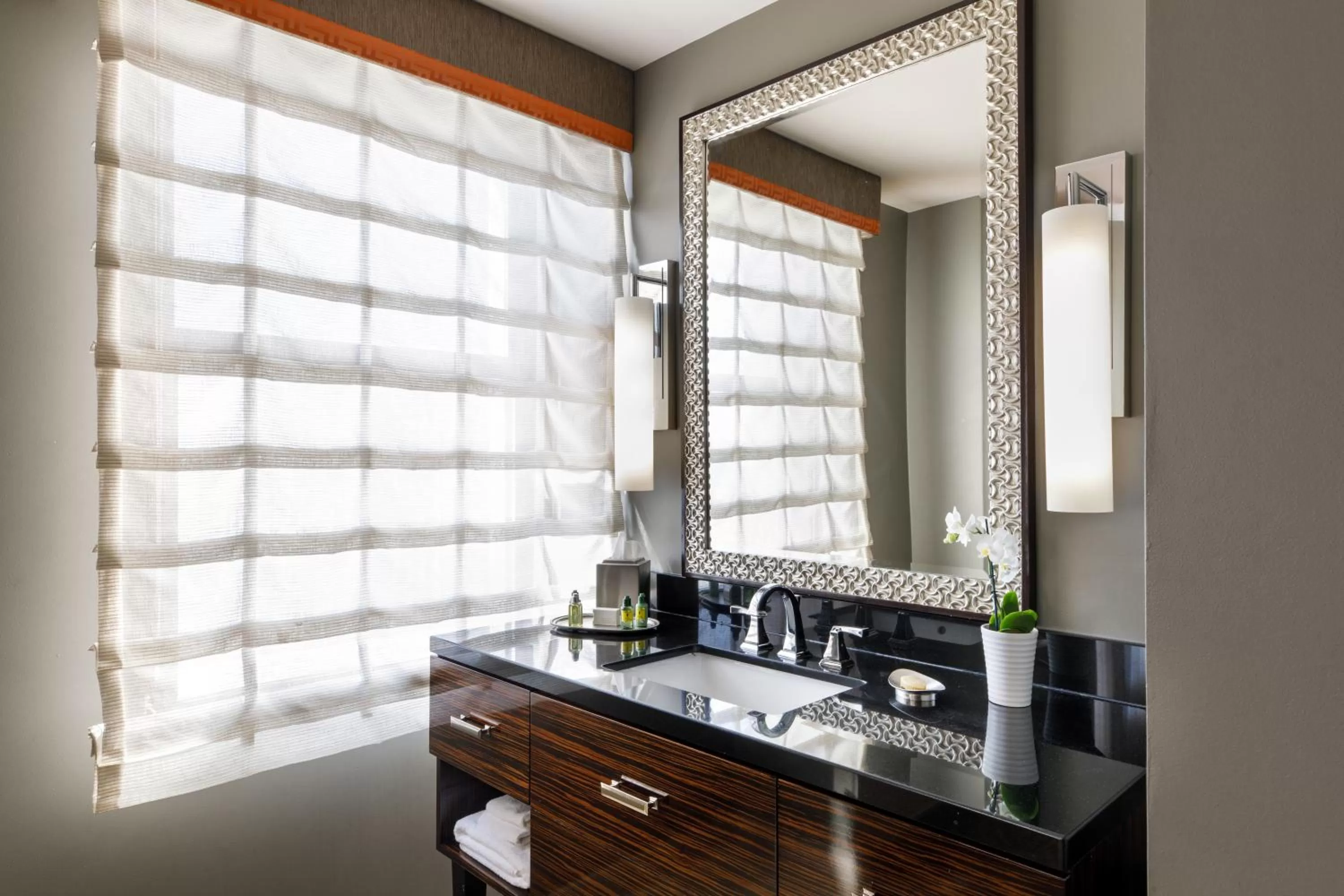 Bathroom in Colcord Hotel Oklahoma City, Curio Collection by Hilton