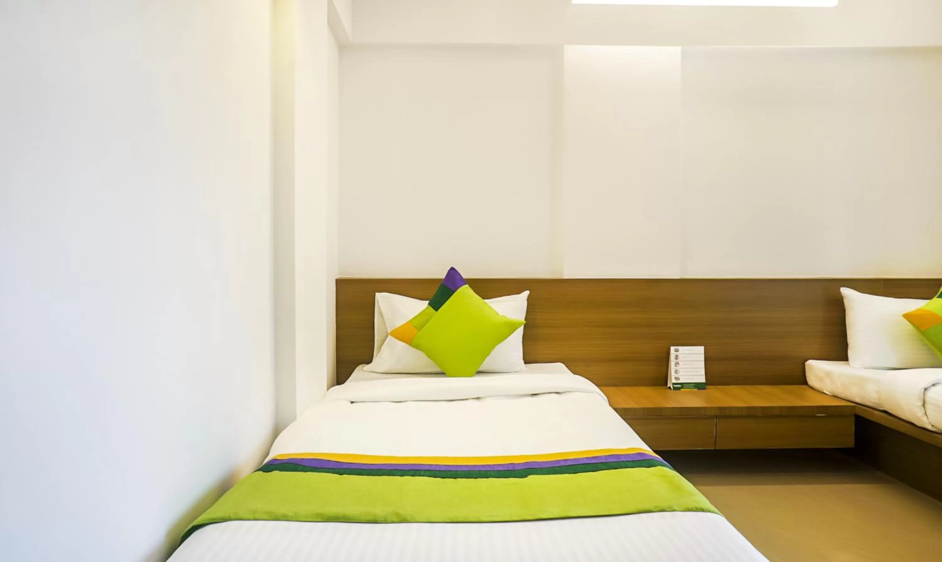 Bed in Treebo Luxe Suite, Shivaji Nagar