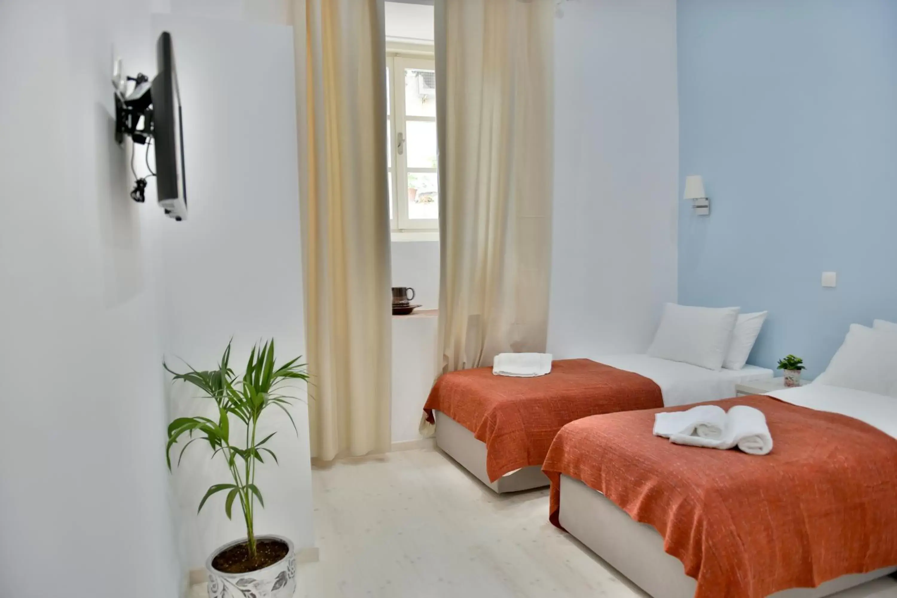 Standard Twin/Triple Room with Yard View in Douskos Port House Standard Twin/Triple Room with Yard View in Douskos Port House