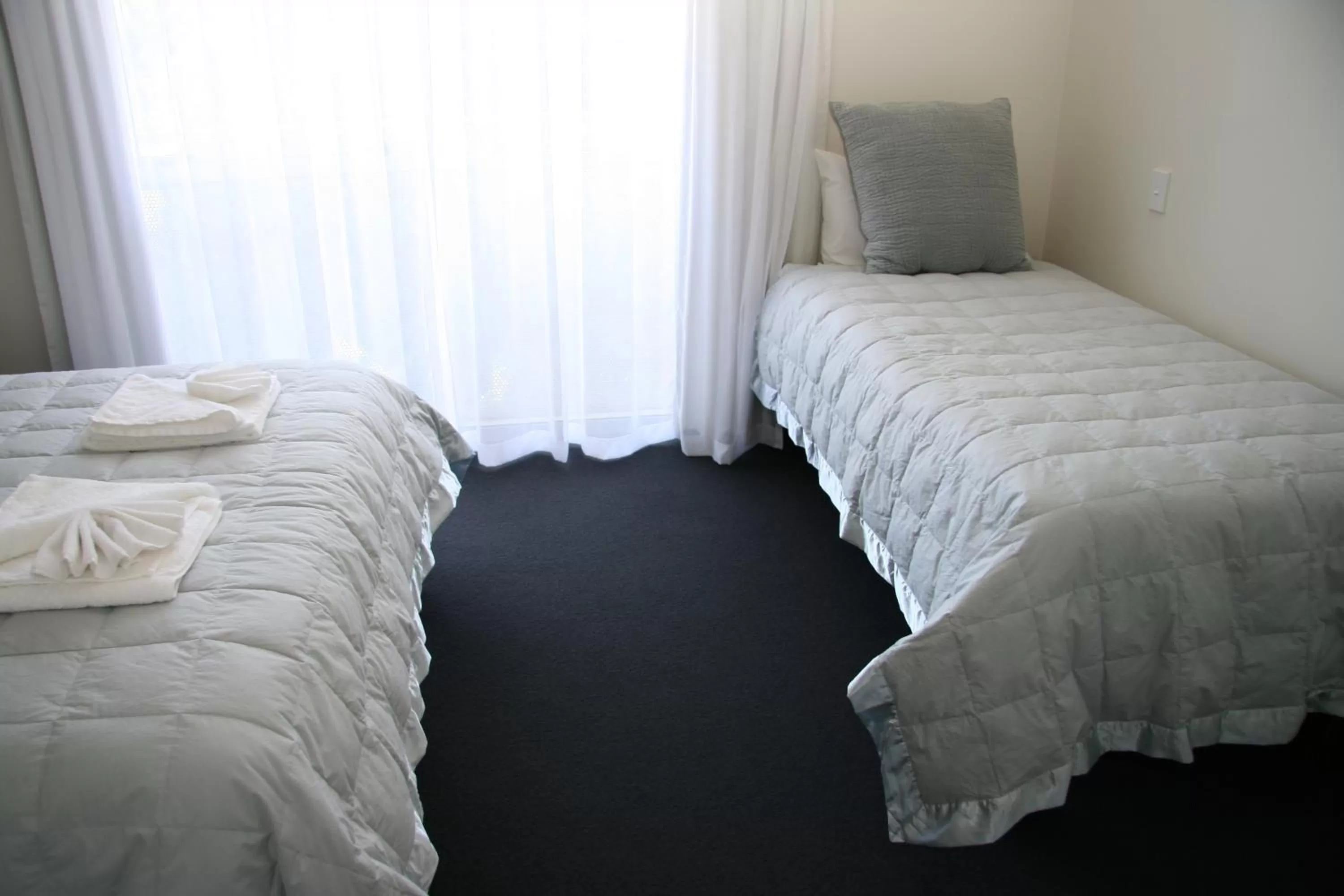 Bed in Oceans Resort Whitianga