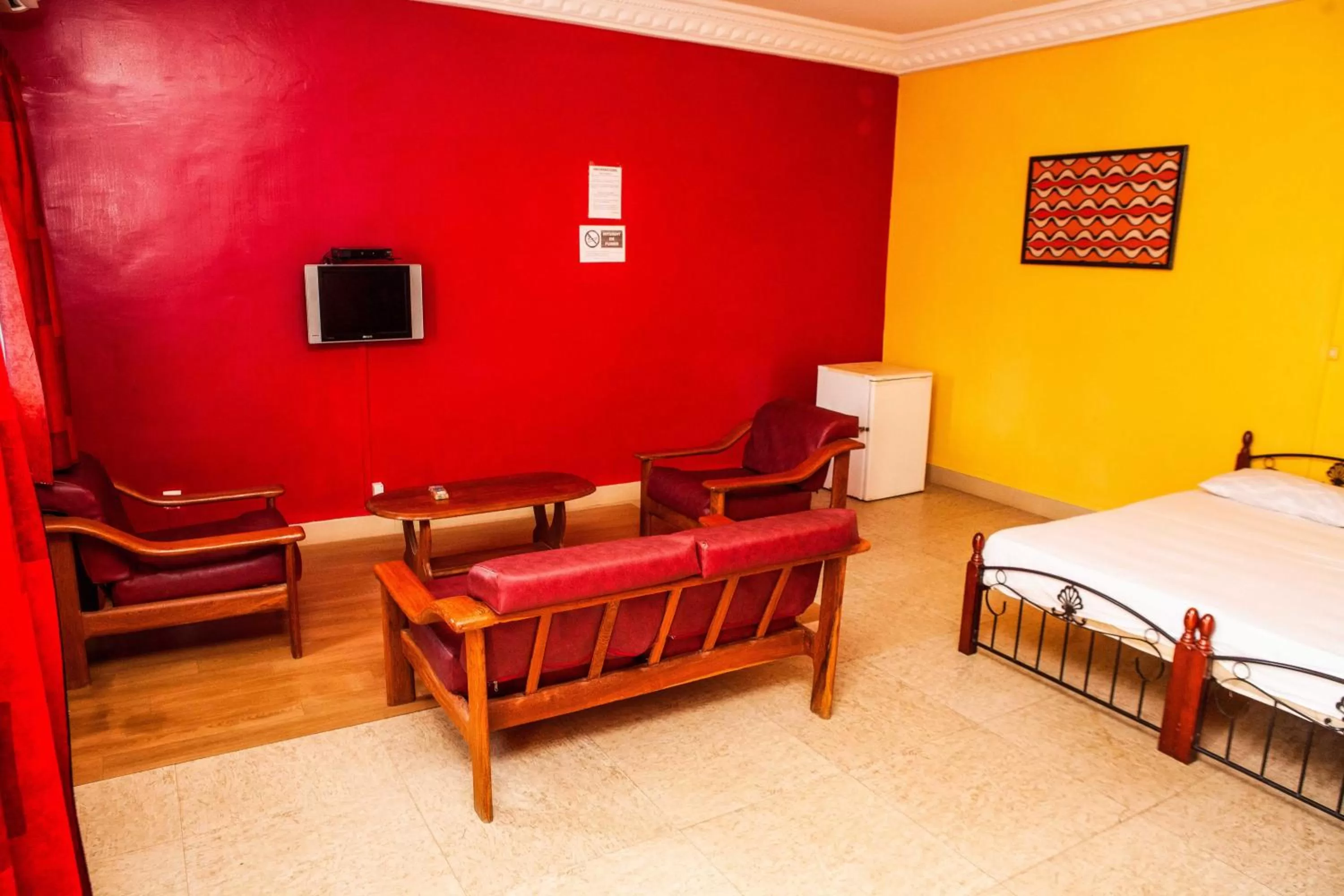 Living room, Bed in Résidence abdou diouf