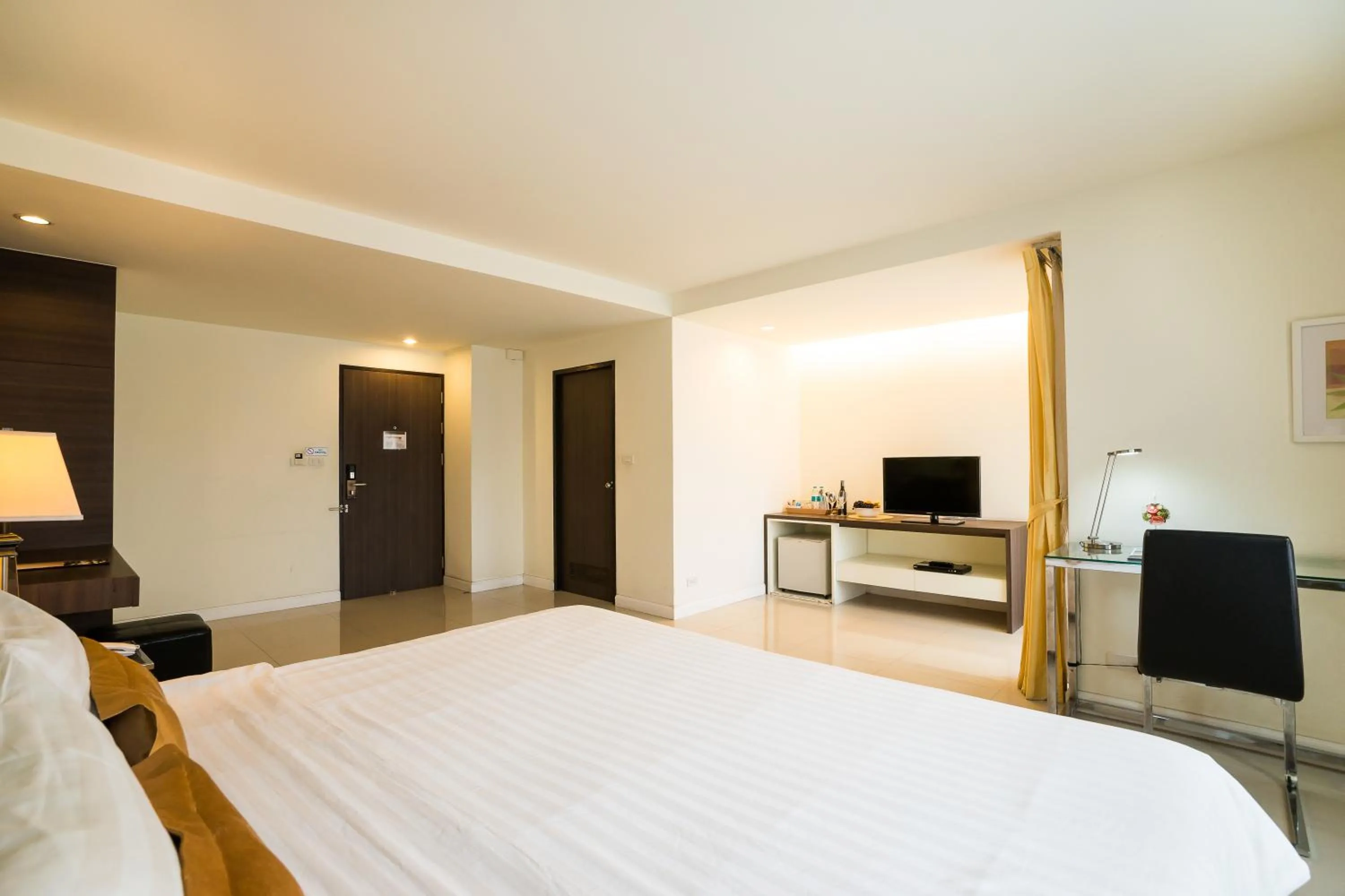 Photo of the whole room, Bed in Beyond Suite