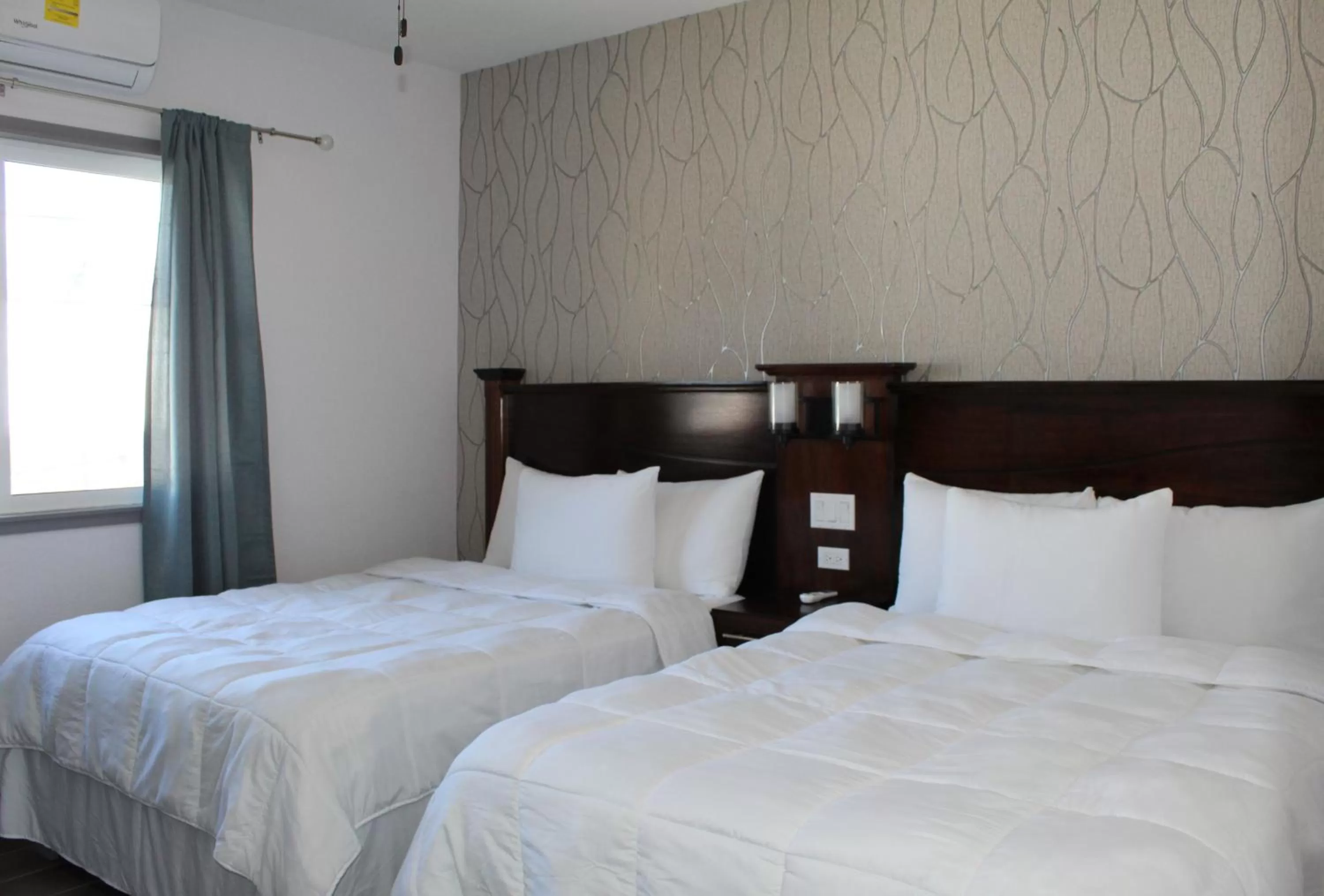 Bed in Barefoot Caye Caulker Hotel