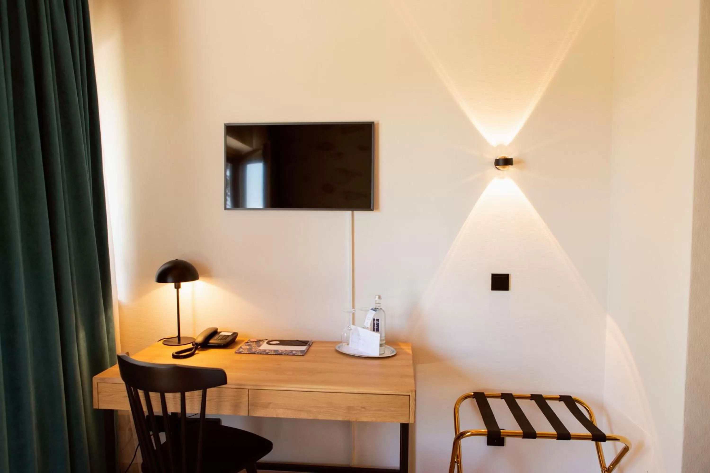 TV/Entertainment Center in Strandhotel SüdSee Diessen am Ammersee