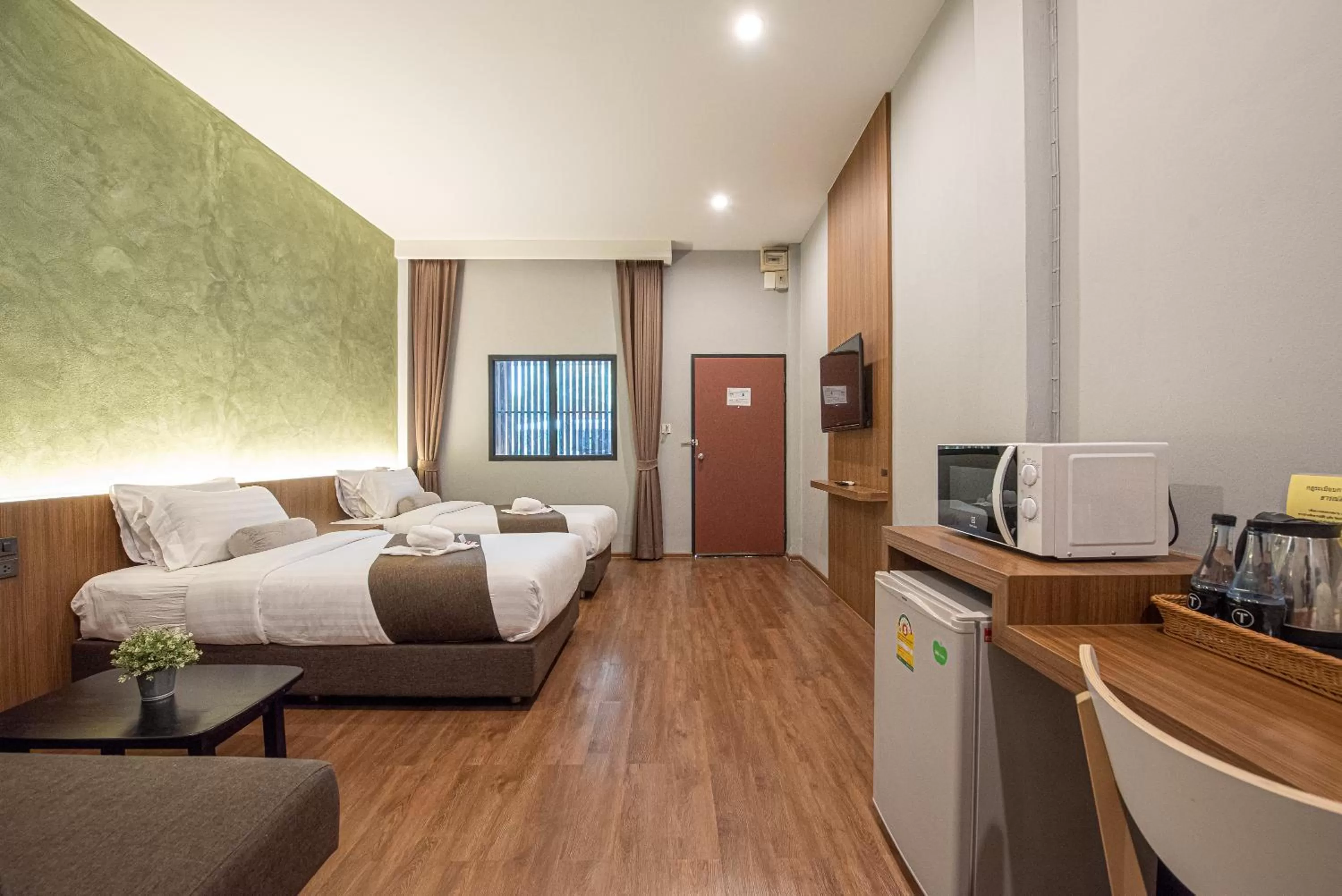 Photo of the whole room, Bed in Tarnsiri Boutique Resort