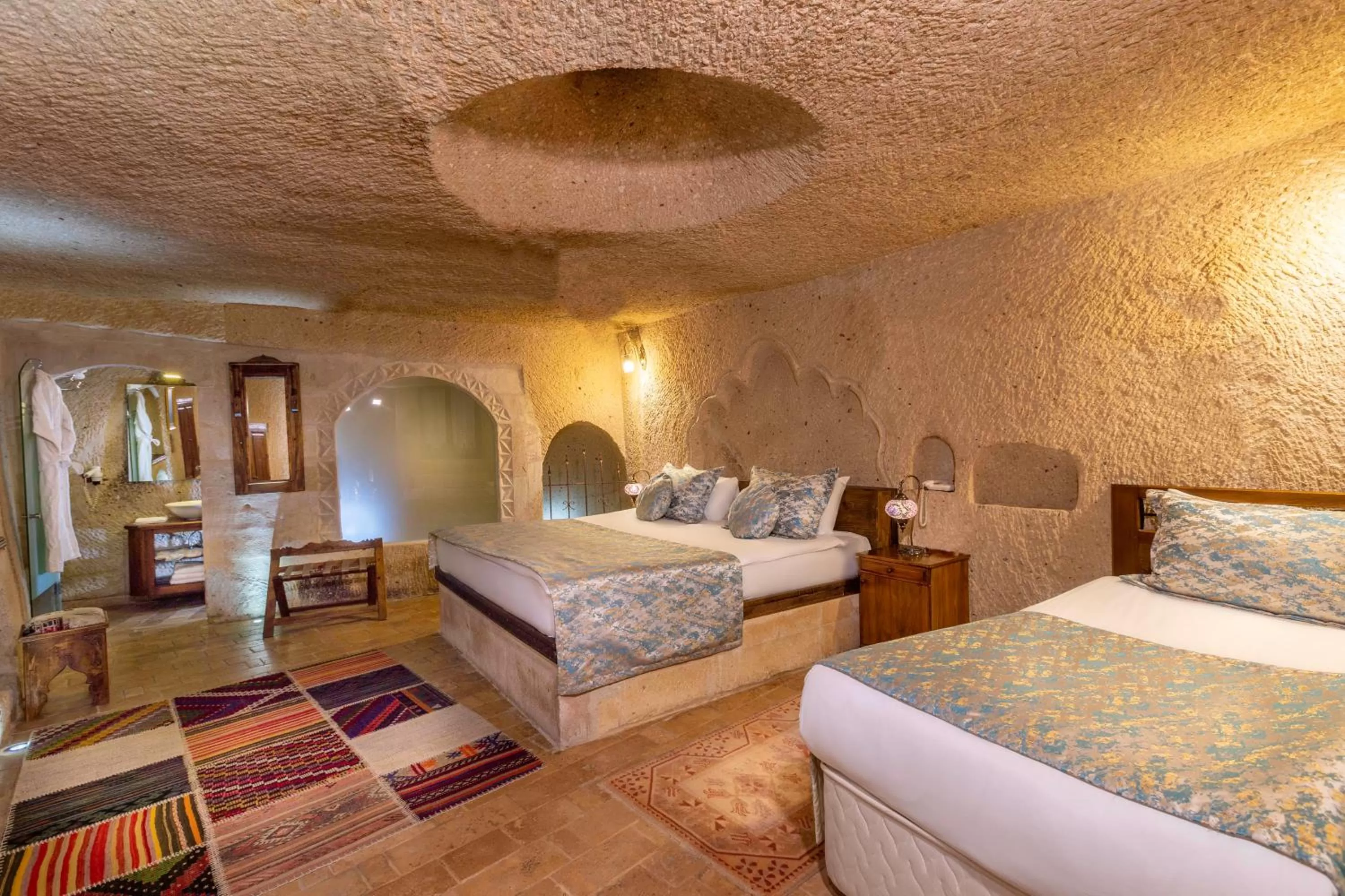 Bed in Adora Cave Suites -