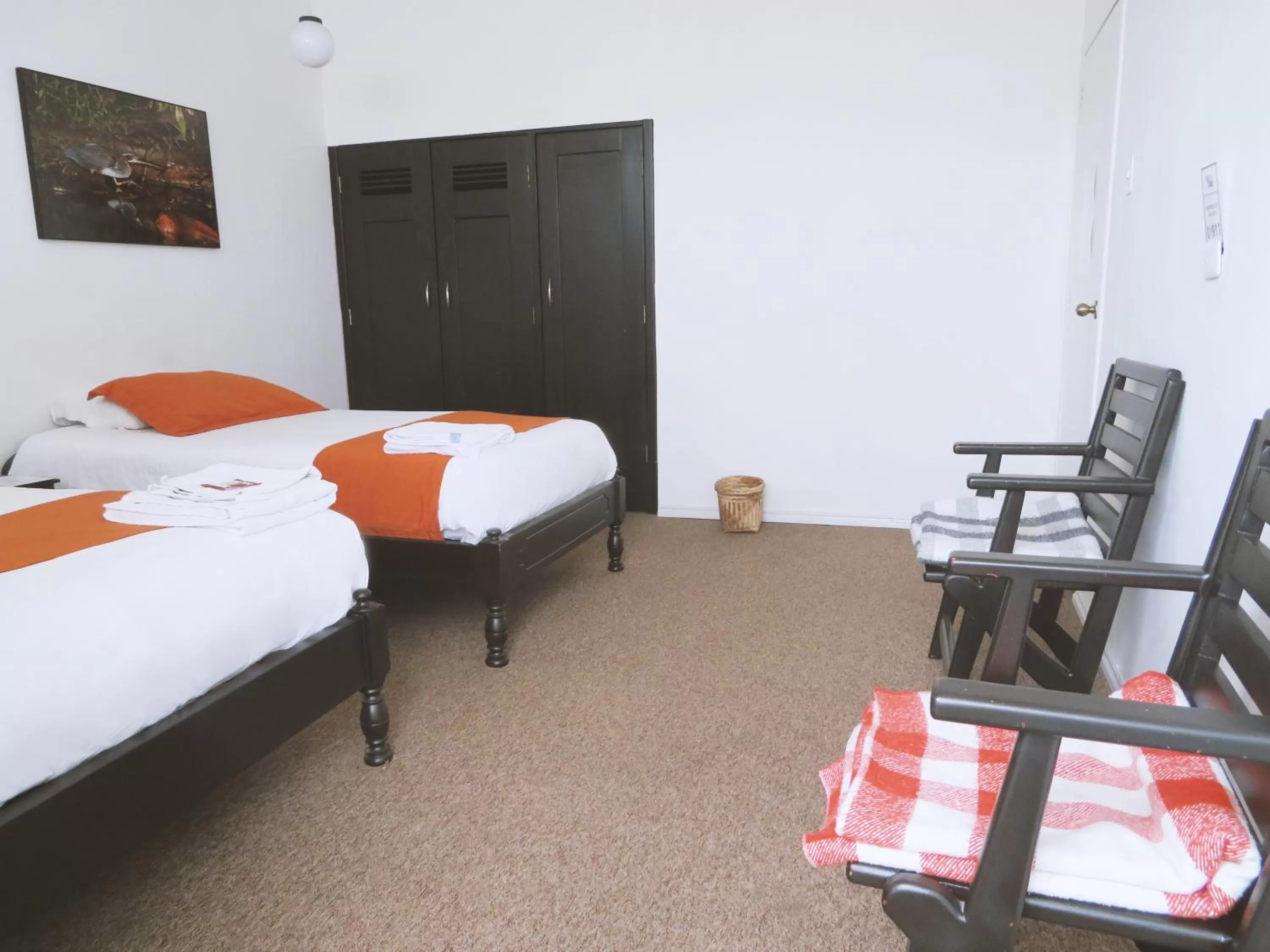 Bed in Bird Garden Guest House