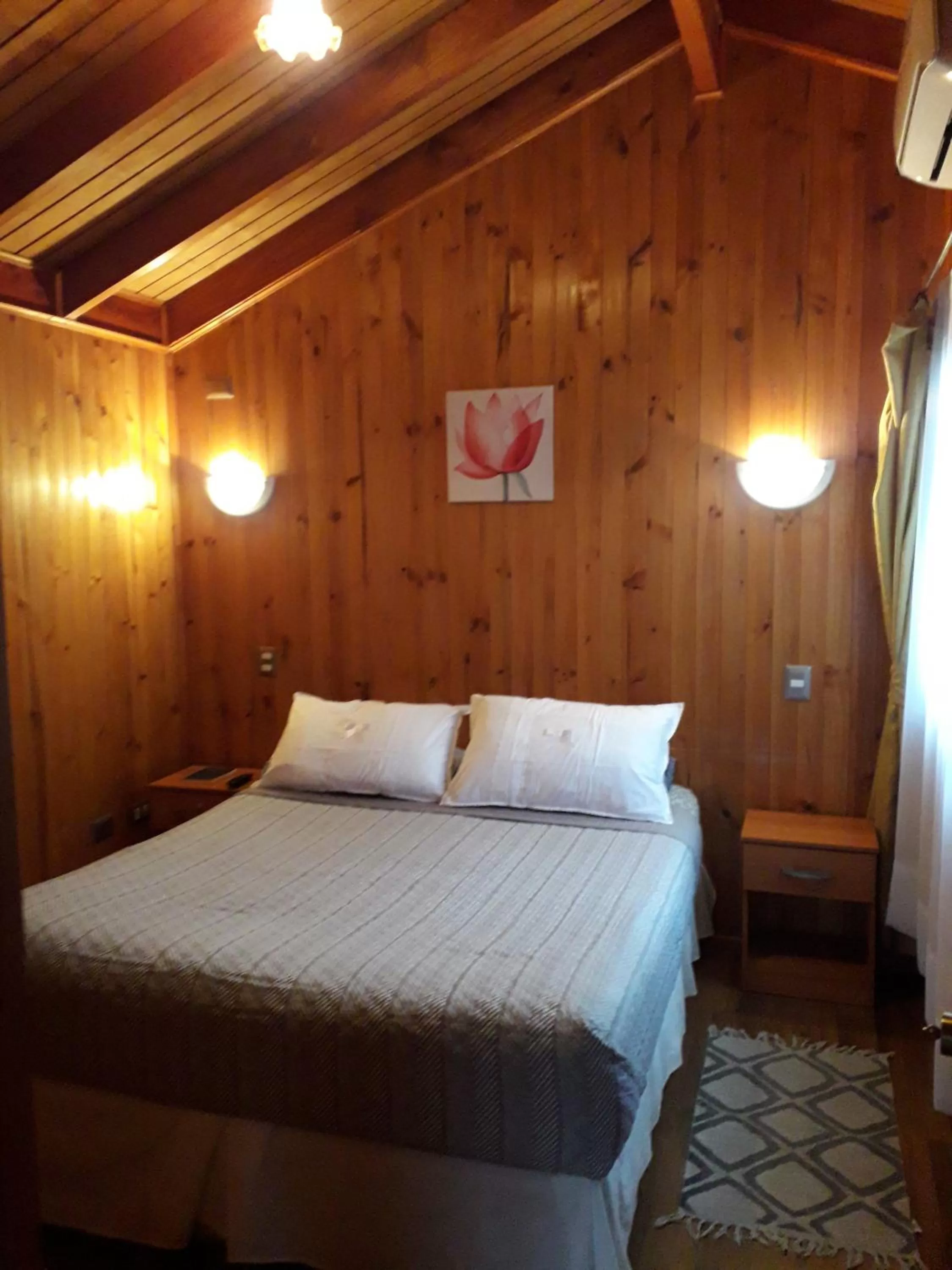 Bed in Apart-Hotel Colonia-Königsberg ESTACIONAMIENTO Deptos Completos Ubicado En El Centro De Valdivia AIRE ACONDICIONADO