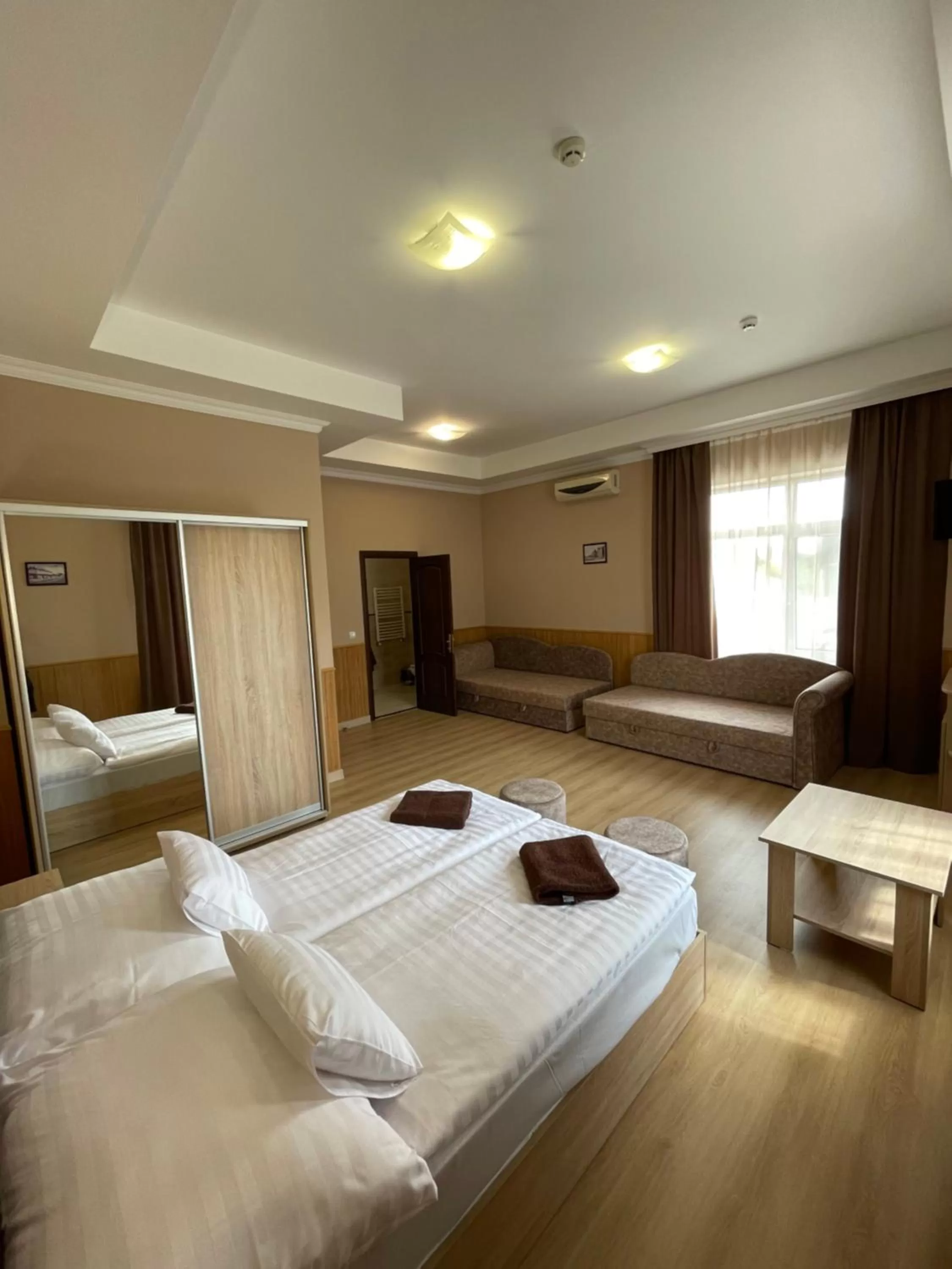 Photo of the whole room, Bed in Praktik Hotel & Restaurant