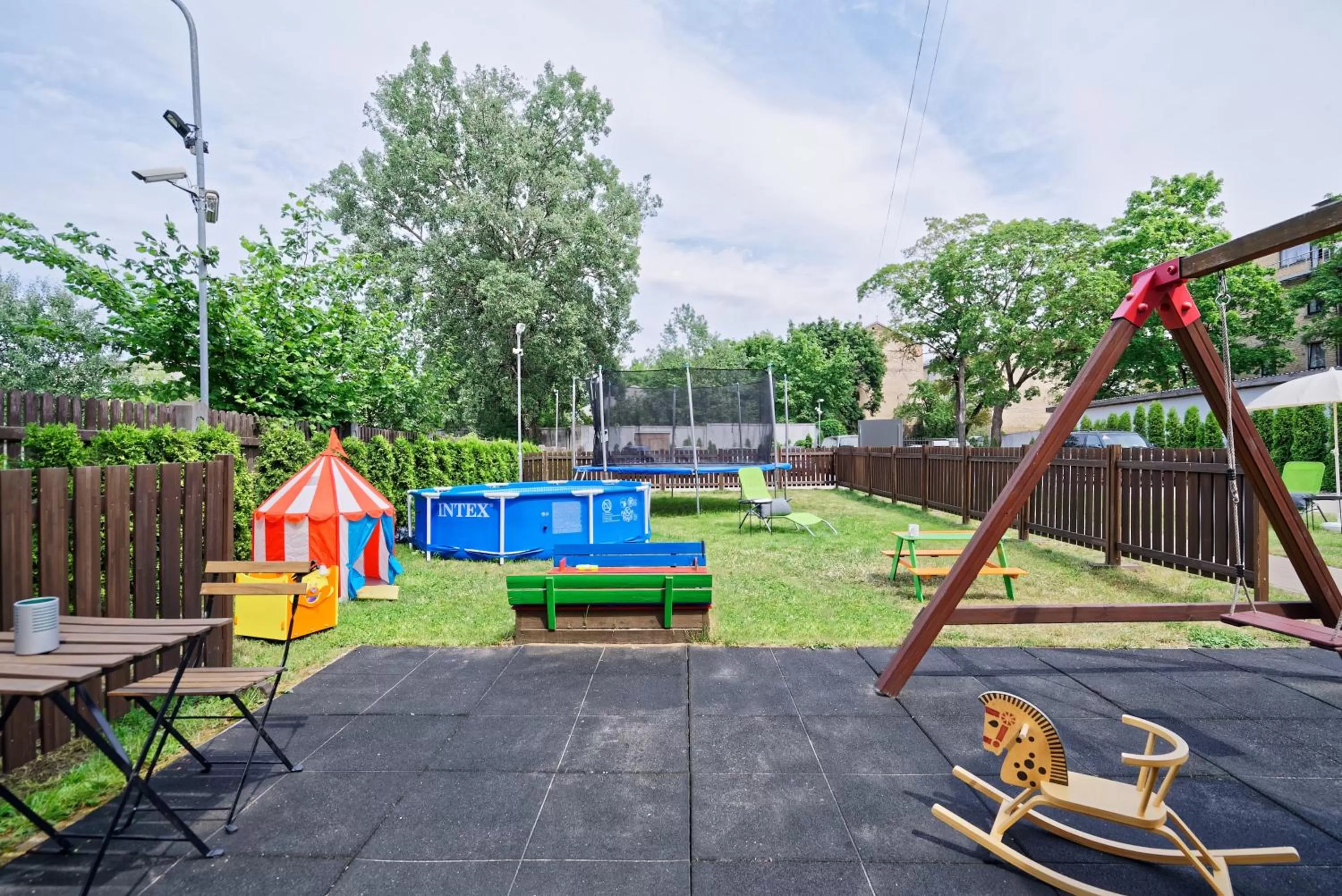 Children play ground in RIGAAPARTMENT SONADA Self-Service Aparthotel - Private Parking