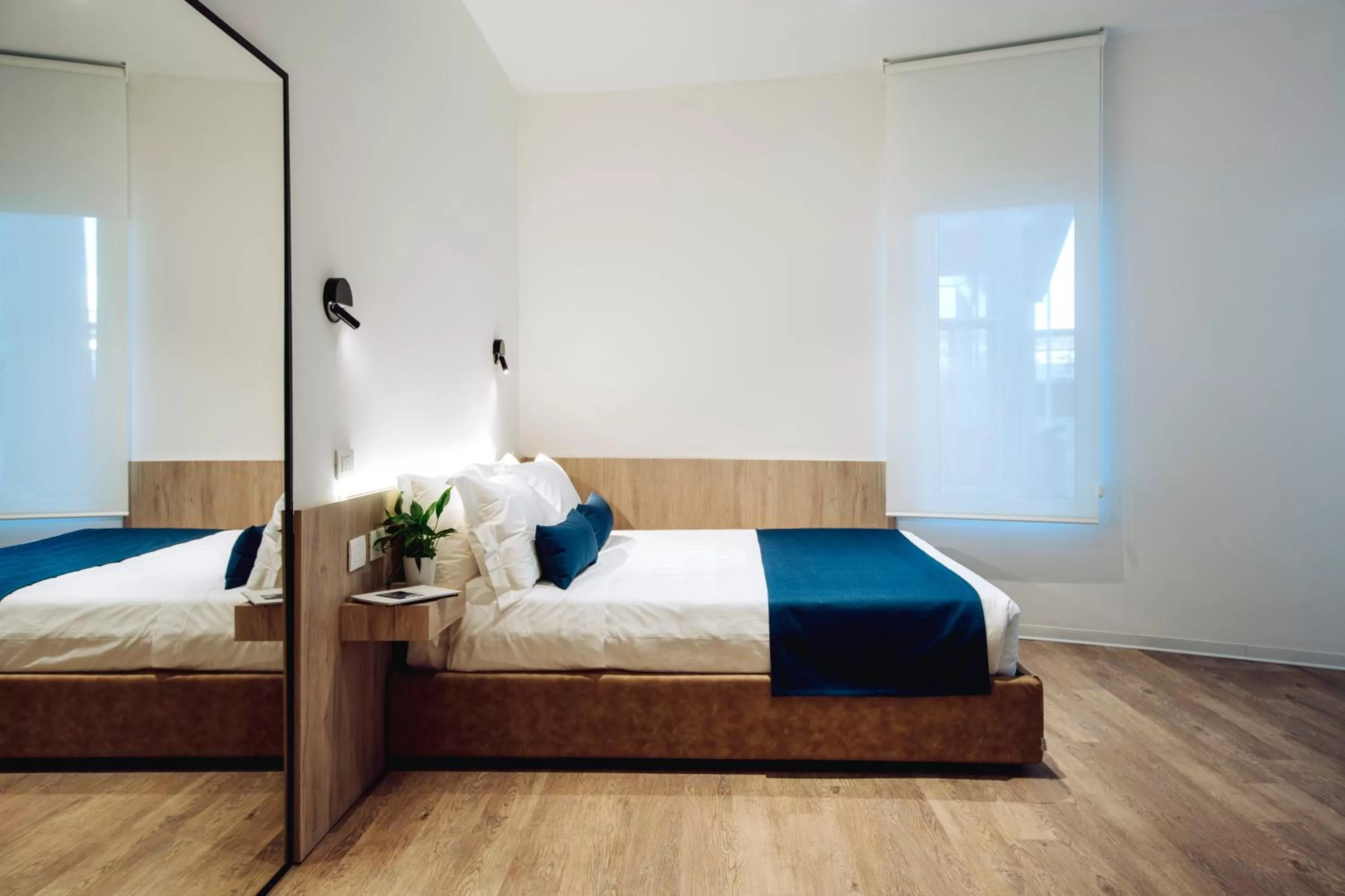 Shower, Bed in Air Rooms Rome Airport by HelloSky