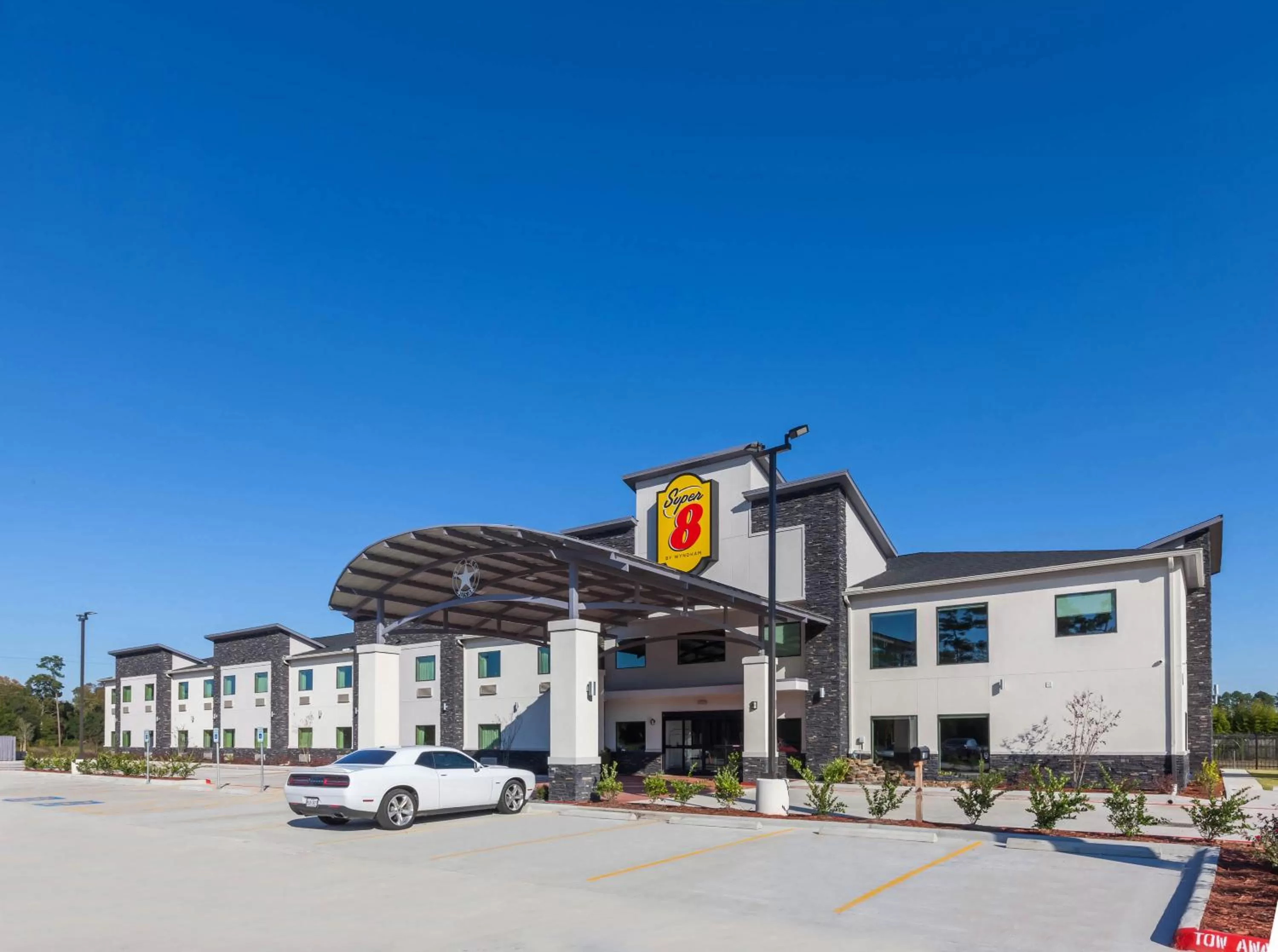 Property building in Super 8 by Wyndham Kingwood Houston North