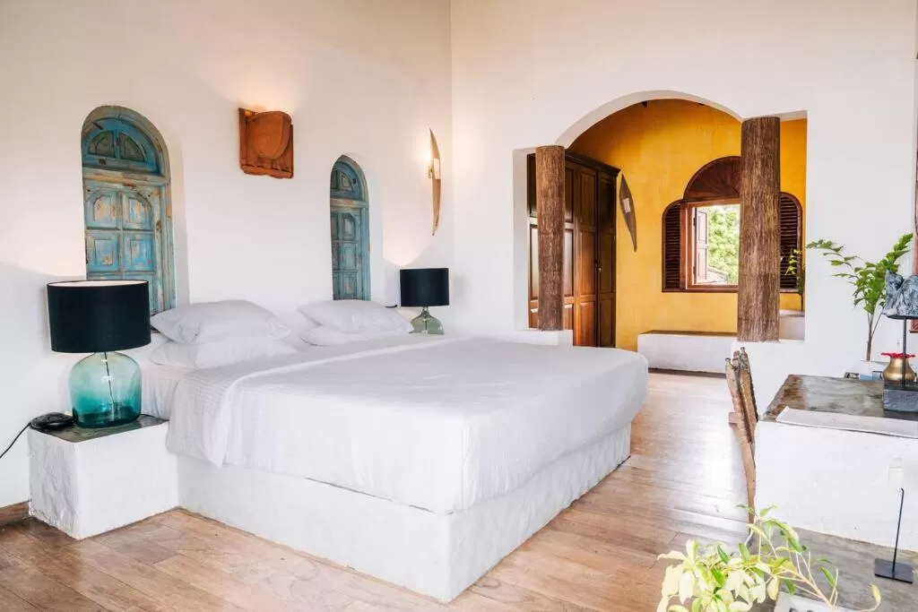 Bed in Sānti Beach House with pool & beach