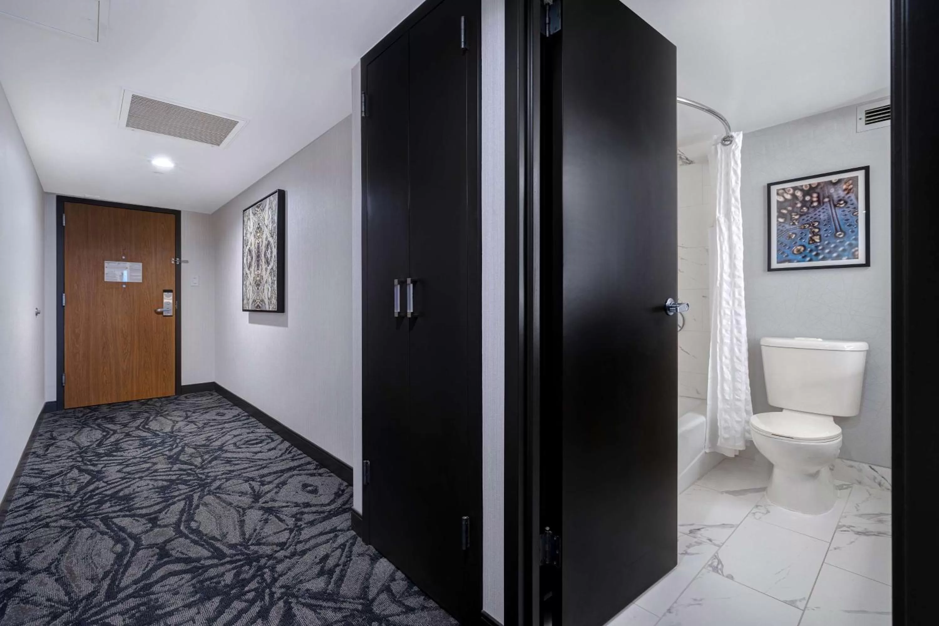 Toilet in Embassy Suites by Hilton Santa Clara Silicon Valley