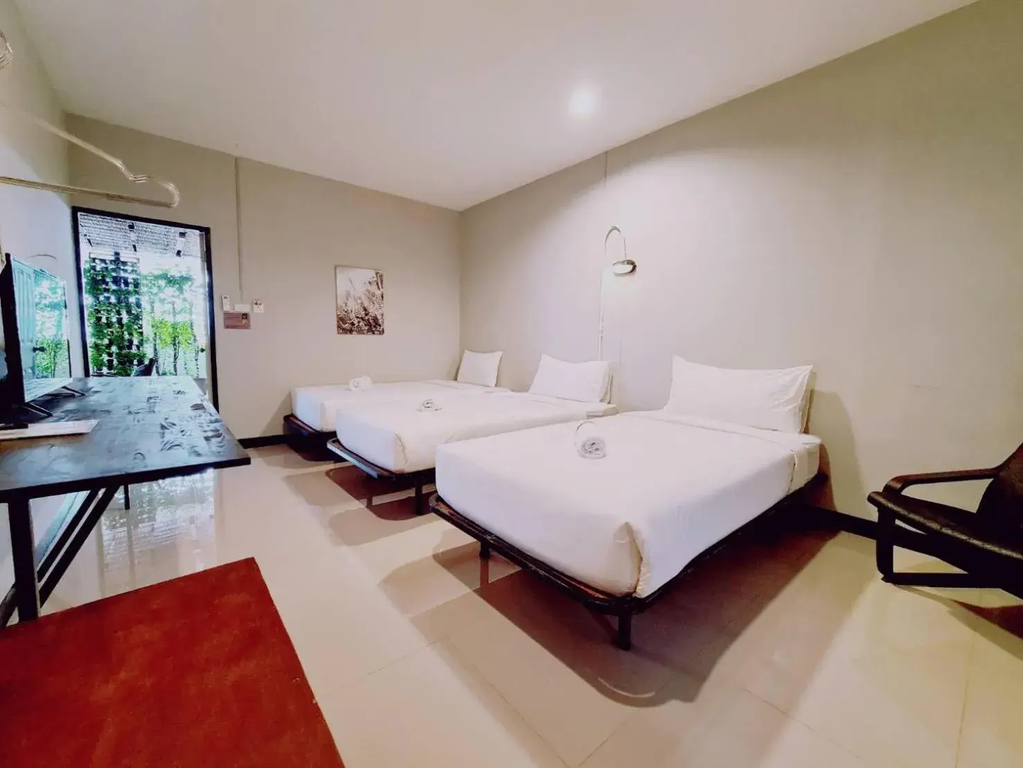 Triple Room with Private Bathroom in The 8 Factory Hotel Phitsanulok Triple Room with Private Bathroom in The 8 Factory Hotel Phitsanulok
