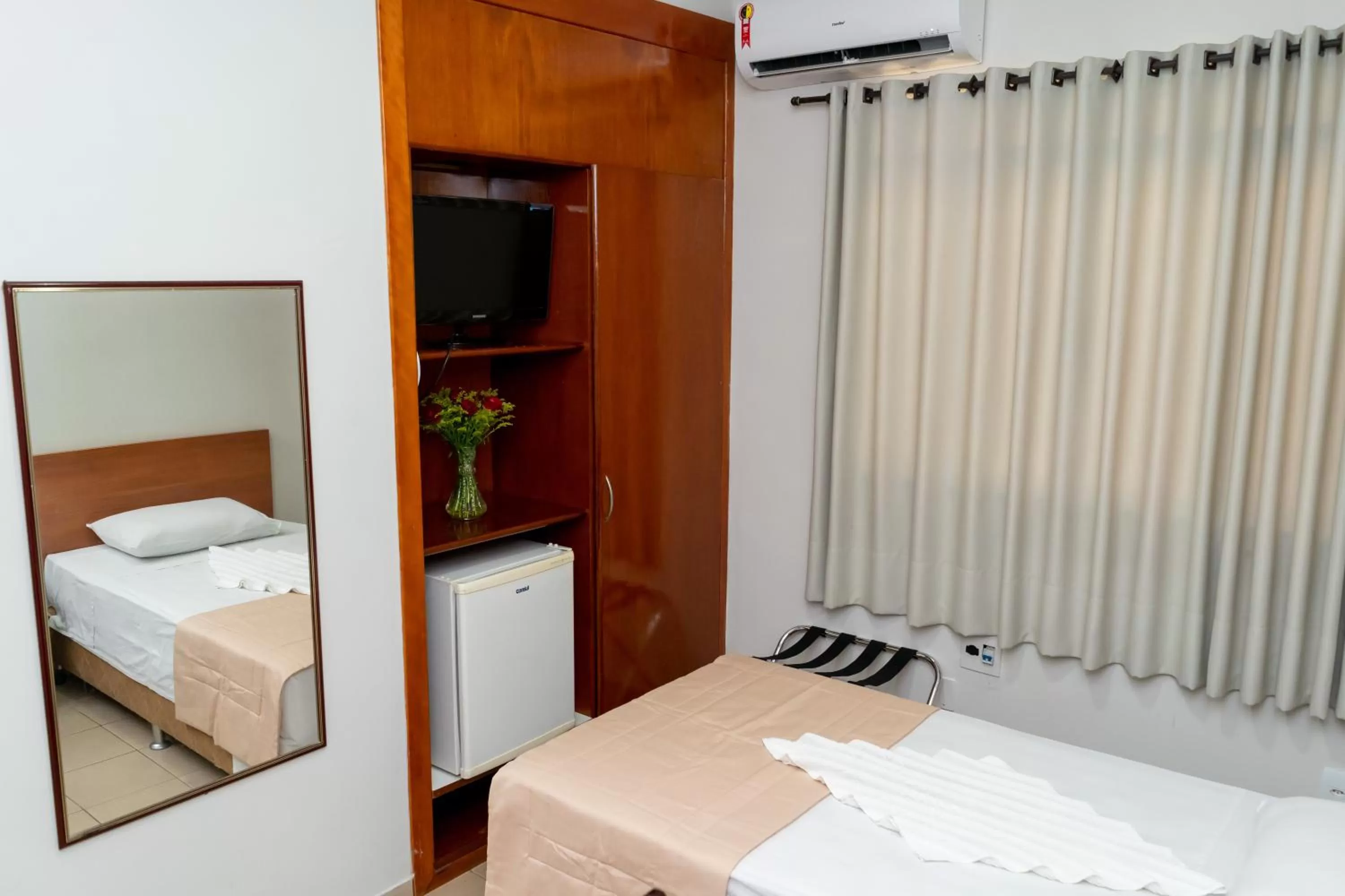 Bed in Bandeirantes Hotel