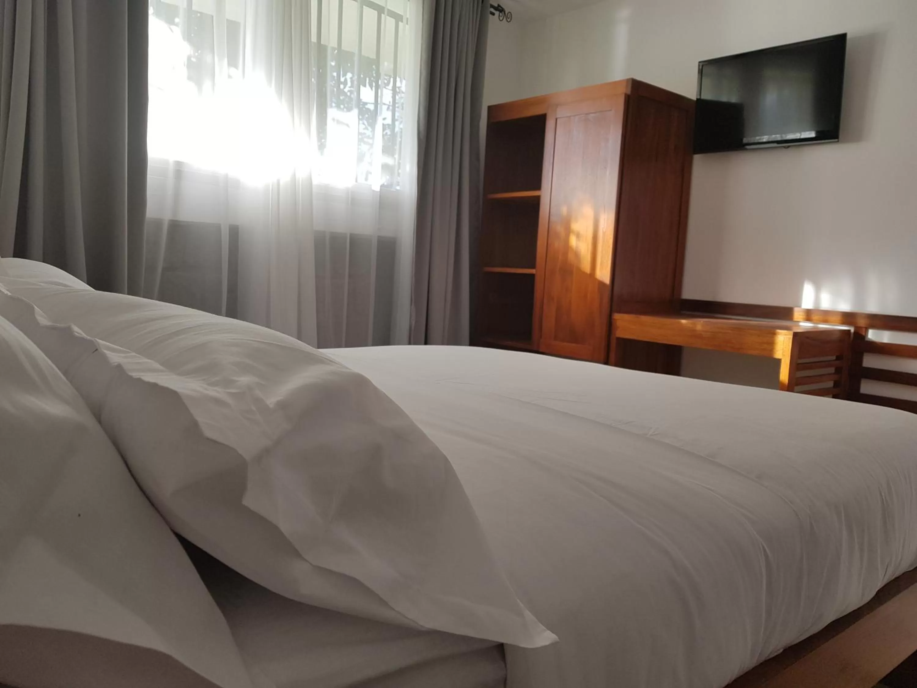 Bed in Ikopa Hôtel Madagascar