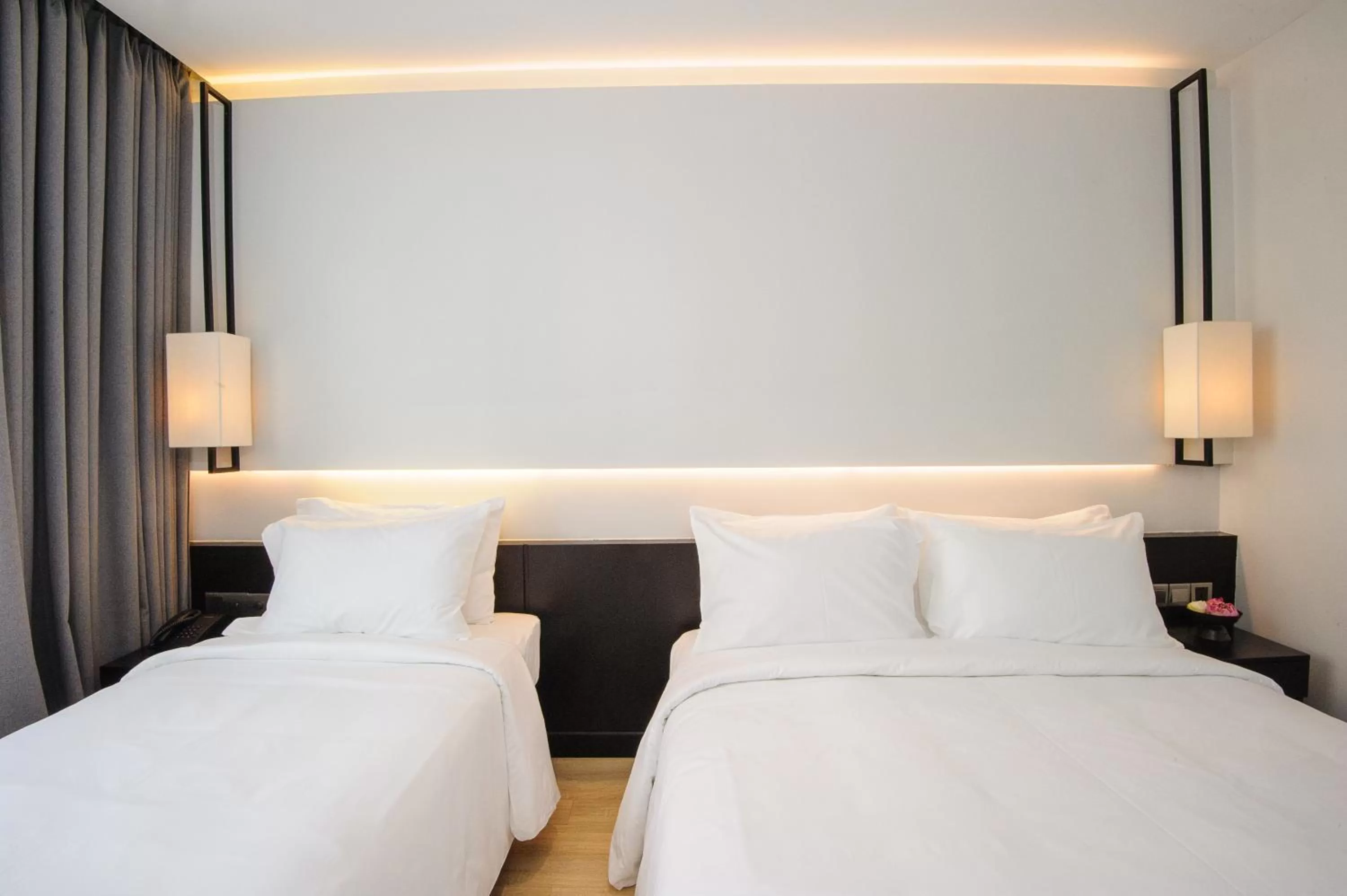 Bed in GLOW PARK HOTEL Grand Royal Palace