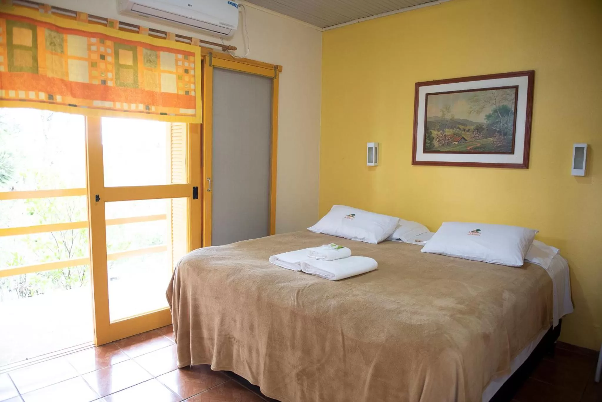 Bed in Pousada da Chacara